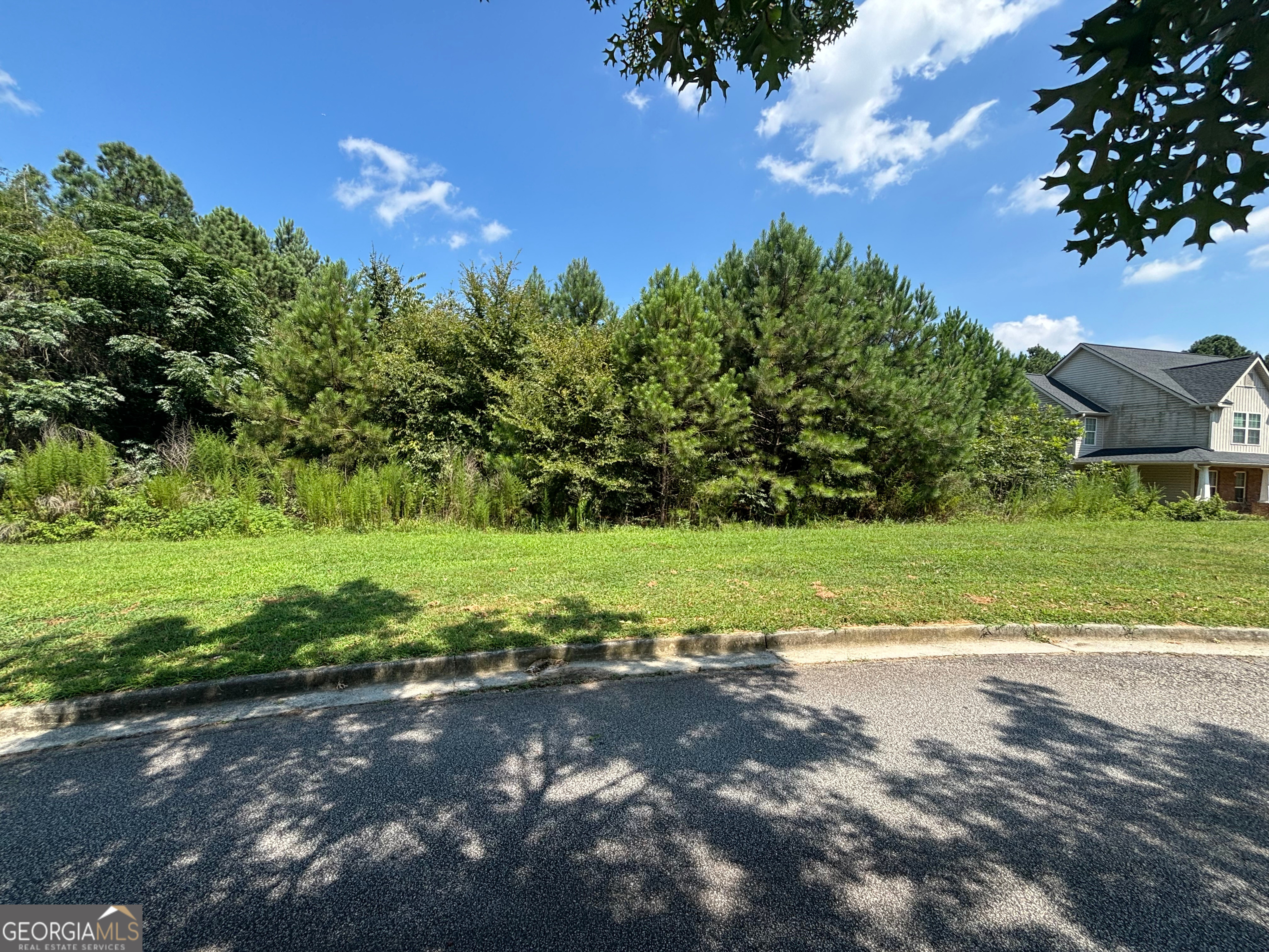 Prime Residential Lot in Crescent View Subdivision - Conyers, GA Discover the perfect canvas for your dream home in the highly sought-after Crescent View subdivision. This spacious residential lot offers an incredible opportunity to build your ideal residence in a serene, well-established community. Property Highlights: Location: Crescent View, Conyers, GA Lot Size: .64 Acres Features: Great level lot in a quiet neighborhood Utilities: Water, Electricity, Internet all available already Why You'll Love It: Convenient Location: Just minutes away from major highways, shopping centers, dining options, and top-rated schools. Tranquil Setting: Nestled in a peaceful neighborhood, this lot provides a private retreat while still being close to urban conveniences. Growth Potential: Crescent View is a thriving community with increasing property values, making this lot a sound investment for your future. Don't miss out on this fantastic opportunity to own a piece of Conyers' most desirable neighborhood. Contact us today to schedule a viewing or for more information on how to make this lot your own!