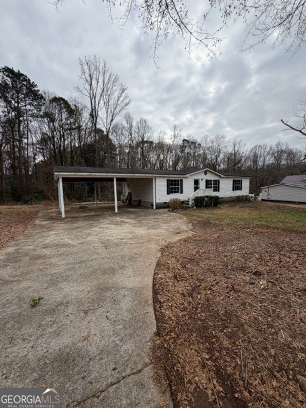 Photo of 174 Navajo Trail, Bowdon, GA 30108 (MLS # 10662657)