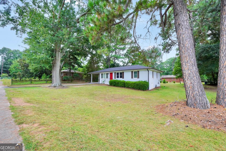 Welcome to this stunning, fully renovated brick ranch home located just moments from the rapidly growing McDonough Square! BRAND NEW ROOF, WINDOWS and SHED!! No detail was overlooked in this high-quality remodel. Step inside to discover fresh interior paint and all-new luxury flooring throughout. The kitchen features crisp white cabinetry, quartz countertops, a stylish tiled backsplash, and top-of-the-line stainless steel appliances-perfect for both everyday living and entertaining. The upgraded bathroom modern quartz vanity top and sleek new fixtures. Enjoy the peace and privacy of a beautifully landscaped, park-like backyard-ideal for relaxing or hosting friends and family. This turnkey home offers an unbeatable blend of modern updates, classic charm, and a prime location near one of Georgia's fastest-growing areas. Dont miss this opportunity!