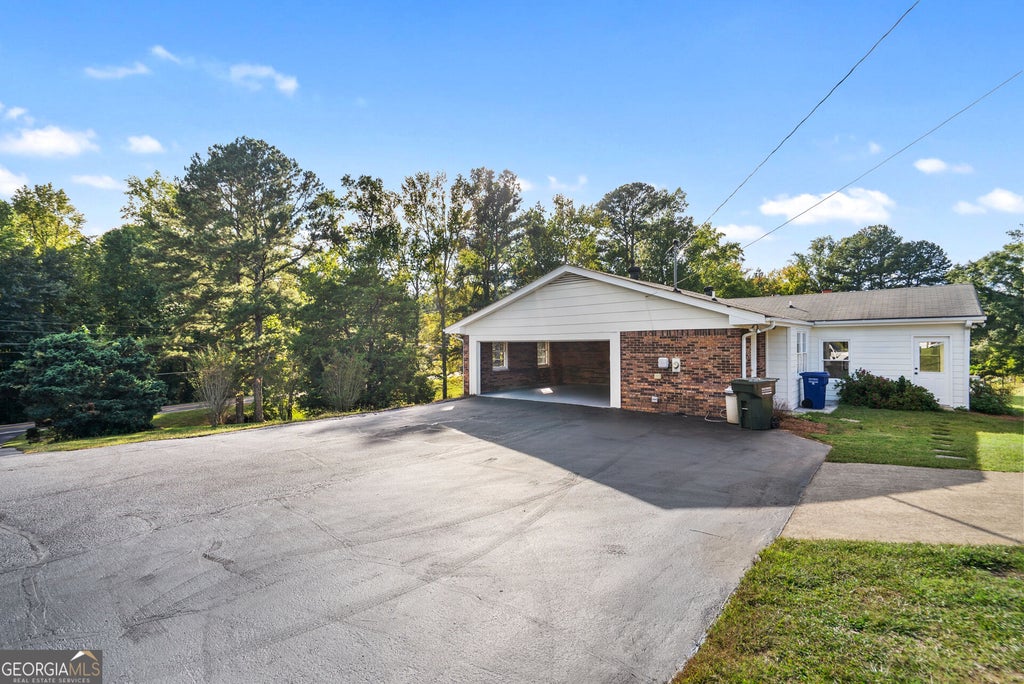 Photo of 6015 Center Hill Church Road, Loganville, GA 30052 (MLS # 10870736)