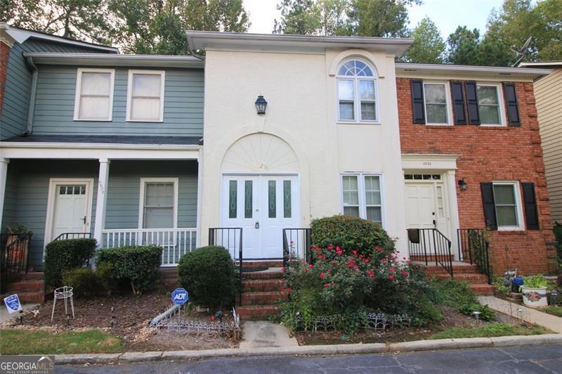 Live where life happens, in the heart of Chamblee! Nestled inside the Perimeter in a quiet, well-kept community, this charming two-story townhome places you minutes from Town Brookhaven, major highways, beautiful parks, and some of the best dining and shopping Atlanta has to offer. Whether youre commuting, exploring, or simply enjoying your neighborhood, this location makes everyday life more convenient and connected. Enter inside to discover a spacious, thoughtfully designed layout that feels both cozy and open. The main level welcomes you with a light-filled family room featuring a stunning stone fireplace, the perfect spot to relax or entertain. Just beyond, the fenced-in patio adds a private outdoor escape for morning coffee or an evening glass of wine. The galley-style kitchen features ample wood cabinetry and includes a refrigerator, opening into a charming dining area thats ideal for casual meals or entertaining friends. Upstairs, the home boasts a roommate-friendly floor plan, featuring two generously sized bedrooms, each with its full private bathroom, which creates a perfect blend of privacy and comfort. A convenient half-bath on the main level adds everyday ease, while abundant walk-in storage ensures everything has its place. Dont miss the private deck off the back of the home, which opens directly to a peaceful community greenspace - your slice of serenity in the city. This home is more than just a rental; its a lifestyle upgrade. With space, style, and an unbeatable location, it won't stay available for long. All Sovereign Realty & Management residents are enrolled in the Resident Benefits Package (RBP) for $35.00 per month, which includes liability insurance, credit building to help boost residents' credit scores with timely rent payments, our best-in-class resident rewards program, on-demand pest control, and more. More details upon application.