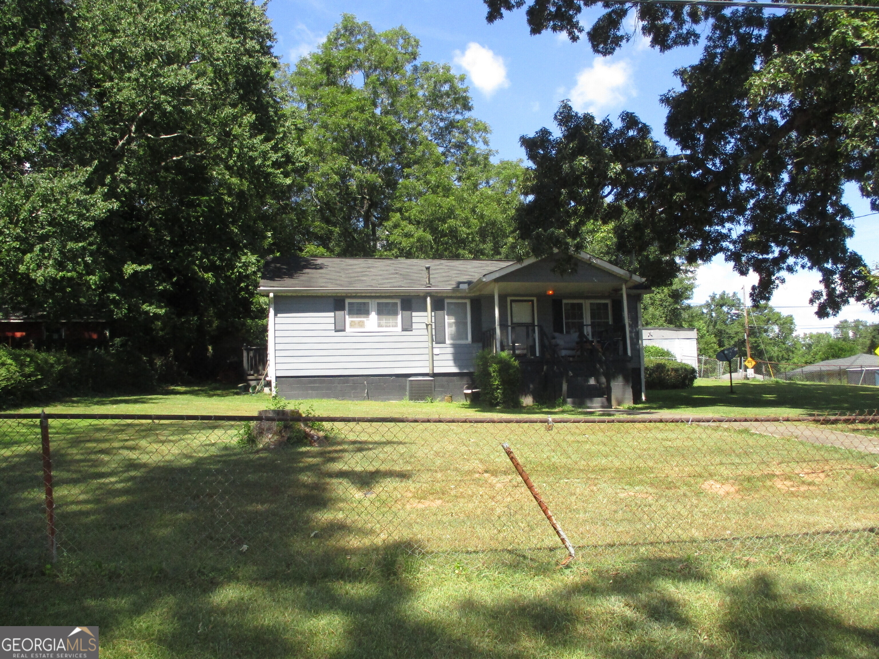 This 3BR/1BA home is an excellent opportunity for your investors or clients seeking a special deal. This property offers great value. The kitchen has space for a dining table, leading to a generous living room with lots of natural light. Appliances, including a refrigerator, gas range and space for washer & dryer. The 3 bedrooms are similar in size. The hallway hosts a full bath with a tub-shower combo. A side door from the kitchen opens out onto the stoop, a large rear yard with fencing, and a detached two (2) car garage currently being used as a work-shop.