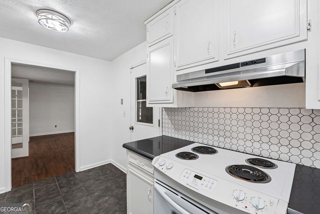 Photo of 750 Dunleith Court, Stone Mountain, GA 30083 (MLS # 10842207)