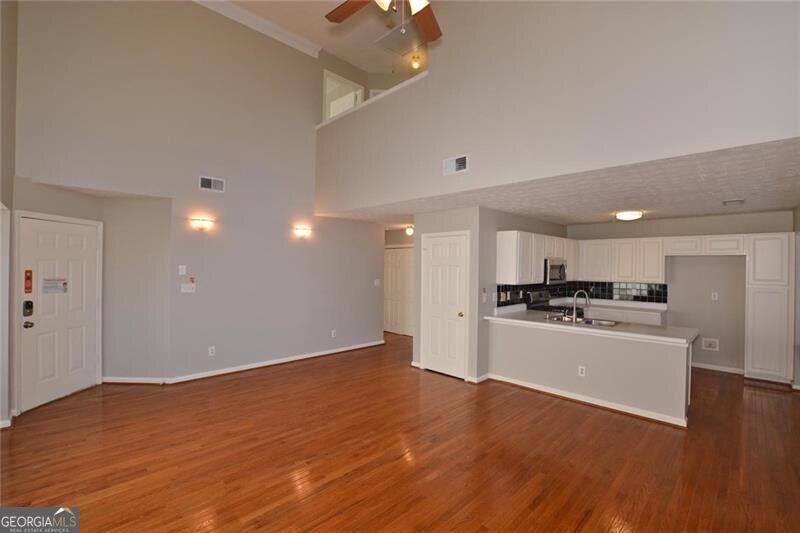 Photo of 1281 Pointe Drive, Lawrenceville, GA 30044 (MLS # 10870831)