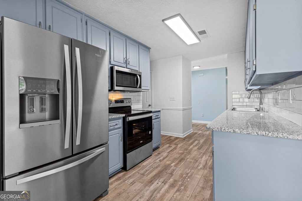 Photo of 484 Creek Crossing Court, Grayson, GA 30017 (MLS # 10657917)