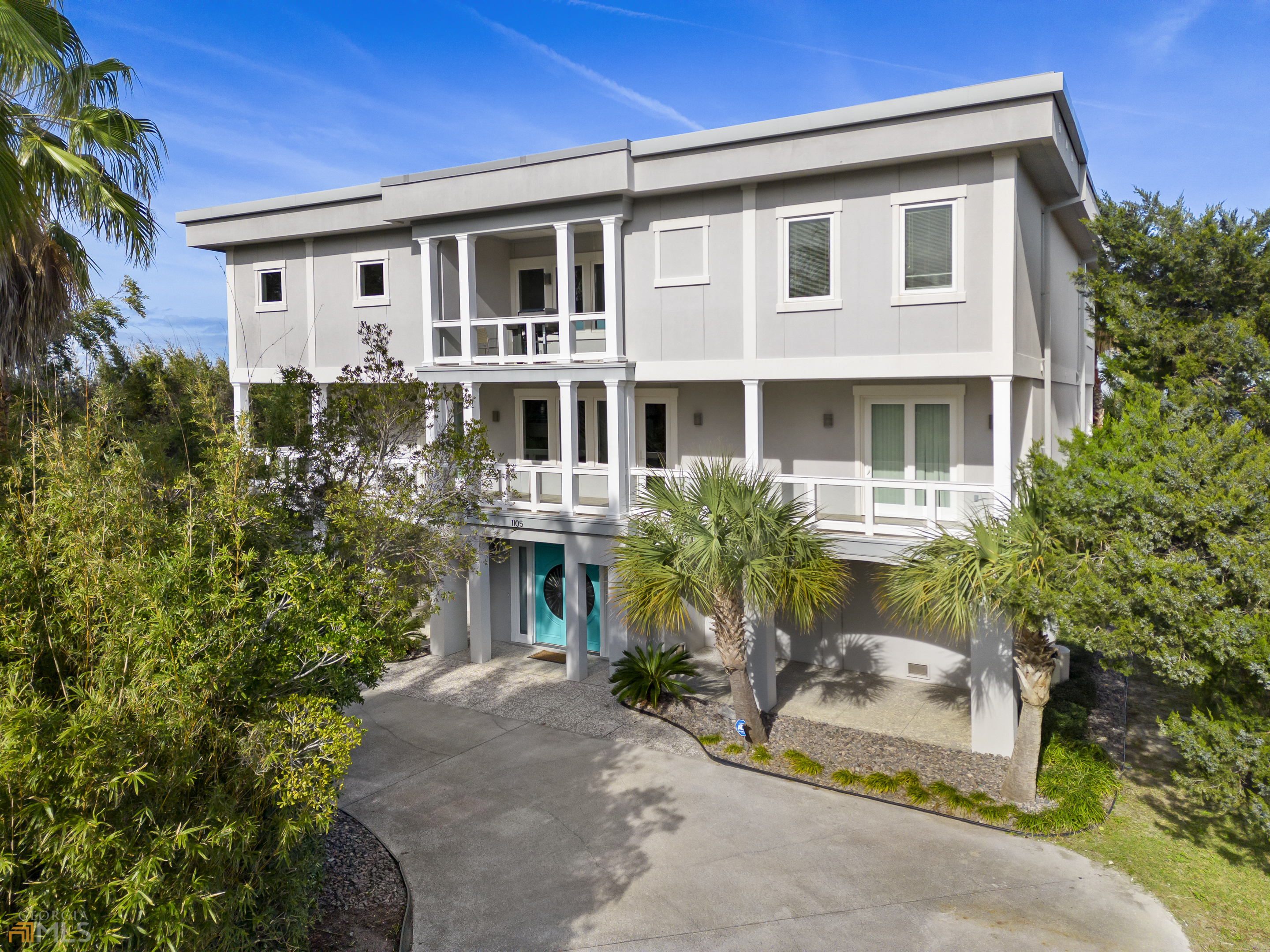 One of the most beautiful views on Tybee. Watch the ships come and go from the balcony each day or watch the dolphins play and jump right before your eyes! Outdoors you will find a heated swimming pool and a hot tub. There is also a gazebo for relaxing outdoors. This home experienced a full renovation in 2012/2013. This home features two kitchens each with Pedini Cabinetry, 6 bedrooms, 5 and a half bathrooms and so much more. Walk in to an over 20 foot high entrance with a steel staircase and take the steps or the elevator. There are spacious porches for entertaining. Ground level is finished and great for added storage and fun. This immaculate home is ready for its new owners.