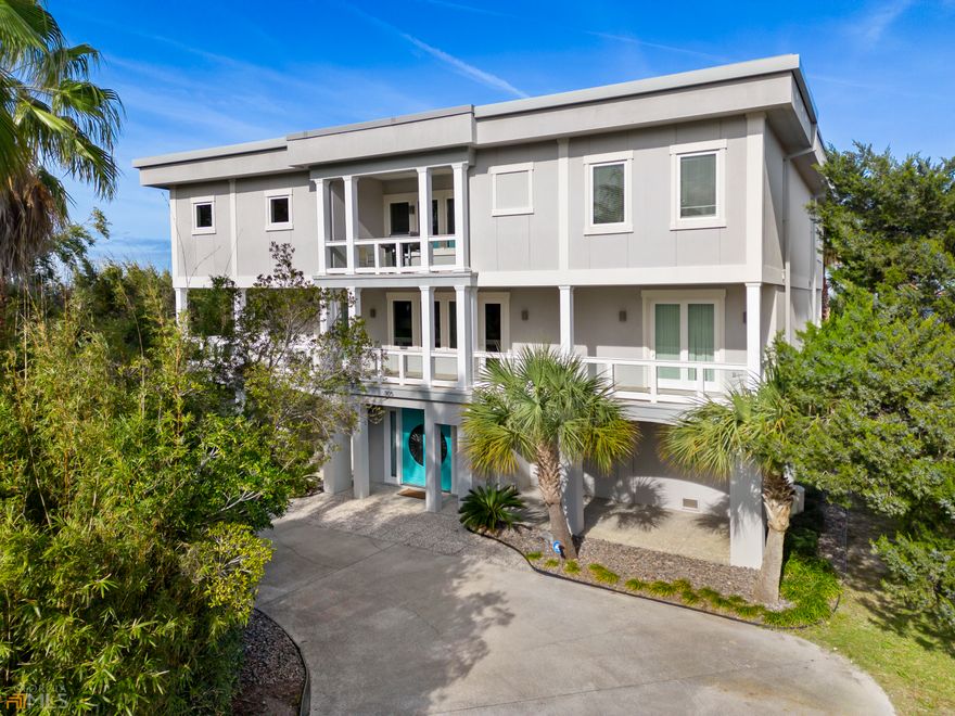 One of the most beautiful views on Tybee. Watch the ships come and go from the balcony each day or watch the dolphins play and jump right before your eyes! Outdoors you will find a heated swimming pool and a hot tub. There is also a gazebo for relaxing outdoors. This home experienced a full renovation in 2012/2013. This home features two kitchens each with Pedini Cabinetry, 6 bedrooms, 5 and a half bathrooms and so much more. Walk in to an over 20 foot high entrance with a steel staircase and take the steps or the elevator. There are spacious porches for entertaining. Ground level is finished and great for added storage and fun. This immaculate home is ready for its new owners.