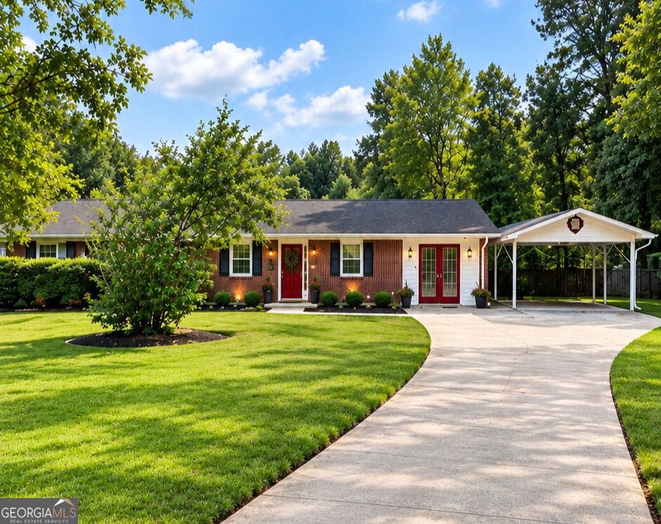 Photo of 345 Oakhill Cir, covington, GA 30016 (MLS # 10857400)