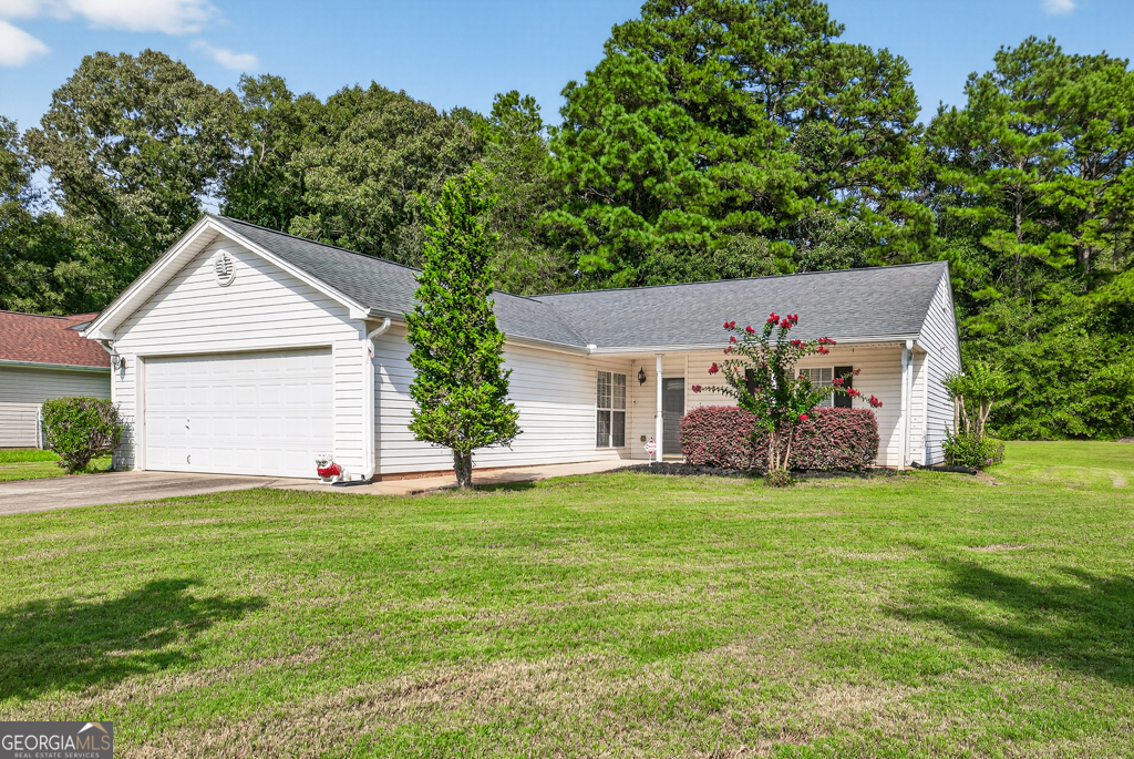 This charming and well-maintained ranch home offers the perfect blend of comfort, convenience, and style. Situated on a spacious, level lot, this 3-bedroom, 2-bathroom gem is ideal first-time buyers, or anyone looking for easy one-level living. Step inside to find fresh new carpet throughout, a bright and open floor plan with ample natural light, a cozy living area, and a functional kitchen. The primary suite features a private bath, while two additional bedrooms share a well-appointed hall bath. Conveniently located just minutes from local schools, shopping, dining, and Highway 316, this home makes commuting and daily errands a breeze! **Professional pictures coming soon**