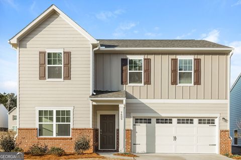 Photo of 7609 Saffron Avenue, Covington, GA 30014 (MLS # 10693529)