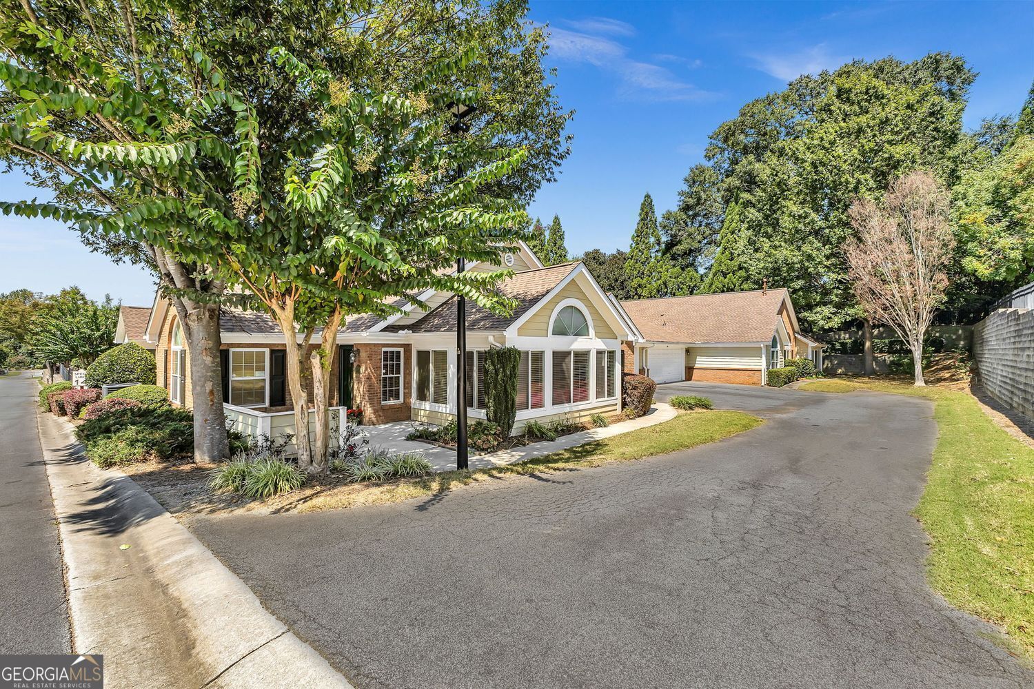 This super clean one level home presents an exceptional opportunity offering a blend of comfort and convenience in a highly sought after location! This home is perfect for someone downsizing or relocating to the area! The living area, freshly painted, provides a generous canvas for personalization and comfortable living. Hard to find, gleaming real hardwood floors are found through out! Oversized, light-filled sun room is perfect for hobby room and is large enough for a home office in the space too!. Or use it as another relaxation area with lots of natural light beaming through! Gracious sized bedrooms with ample closet space are a plus! The open floor plan offers a fully equipped kitchen, spacious dining area and fireside great room which equal to a comfortable space to relax and enjoy! Well maintained interiors, newer AC unit, new roof ,no outside maintence add up to a fabulous home for those looking for easy living! It is located in a quaint community where old fashioned sense of community exists! See this one and you are HOME!