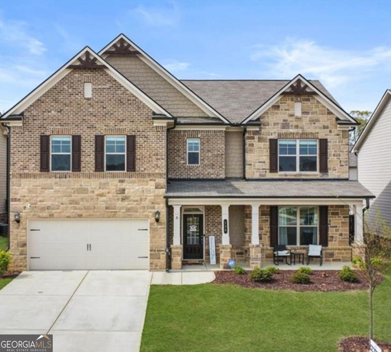 Do you desire to Rent a pristine home that is 4 years old and Fully Furnished ? You've found it! Open the glass paneled door and you're instantly welcomed with a wide and open foyer and divine LVP flooring on the entire home. Formal Dining room, Follow the glistening hardwoods to the warm and cozy family room which features a stone fireplace and offered high ceiling. The gourmet kitchen boasts an oversized granite island with under mount sink, pendant lights, ample 42" white cabinetry with crown molding, stone backsplash, and 5 burner gas stove! Foodies will absolutely adore the insanely large walk-in pantry which is literally the size of a bedroom and can hold all sorts of grains, legumes, packaged goods, and kitchenware. Let's not forget to mention that the stainless steel appliances such as the side by side refrigerator, built-in microwave, dishwasher, and oven are all included! Soaring 9 ft ceilings and a discreet mud room off the garage complete the main level of this dynamic home. A wrought iron spindle staircase leads you to the upper level where you will find more 9 ft ceilings and an impressively sized versatile loft that can be used as a playroom, media center, work studio.. the opportunities are endless! The huge owner's suite is tranquil and inviting with a trey ceiling and plenty of natural light. The owner's bath features a dual vanity with granite countertop, tile flooring, soaking tub and frame less walk-in shower. The owner suite's closet is massive and a must see! The three additional bedrooms are extraordinary in size and have access to a private bathroom with dual vanity. Enjoy the balmy Georgia weather in your grand screened-in patio with fireplace and ceiling fan! Step outside the patio into your humongous fenced in backyard where kids and pets can play safely and where you can grow any plants you desire! This beautiful abode has been meticulously cared for and it shows. Amazing amenities include a sparkling pool and playing field with gazebo! It's time to stop searching and come home to your future residence furnished and ready for your family.