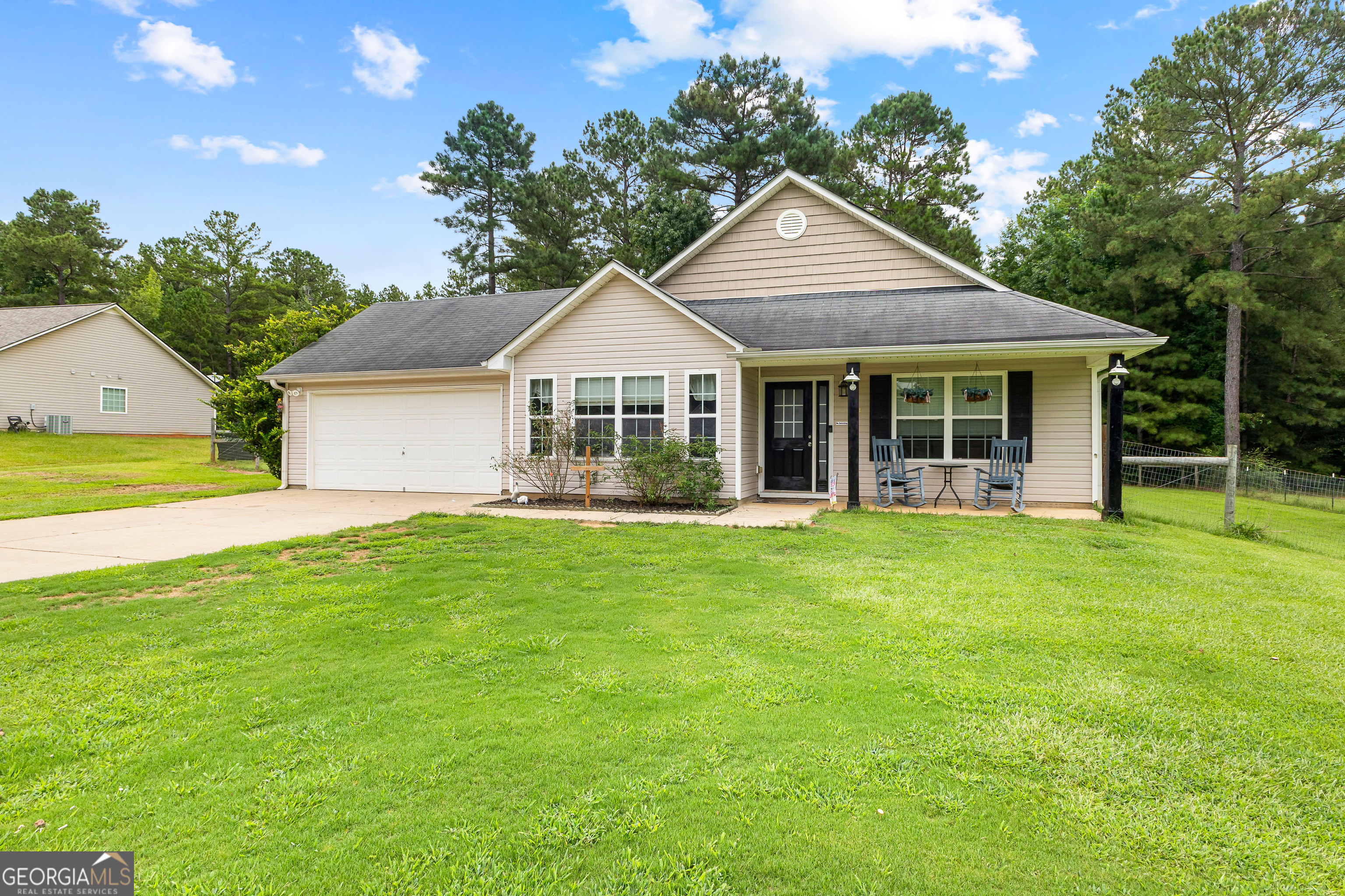 Welcome to this charming 3-bedroom, 2-bath home located in the highly sought-after Senoia area! Step inside to discover a bright and inviting floor plan, perfect for both everyday living and entertaining. The oversized master suite is a true retreat, featuring ample space, a walk-in closet, and a private bath with a separate soaking tub and shower. The secondary bedrooms are generously sized and share a full bath. Outside, enjoy a large fenced backyard - ideal for pets, play, or relaxing evenings under the stars. This home offers the perfect blend of comfort, style, and location. Don't miss the chance to make it yours!
