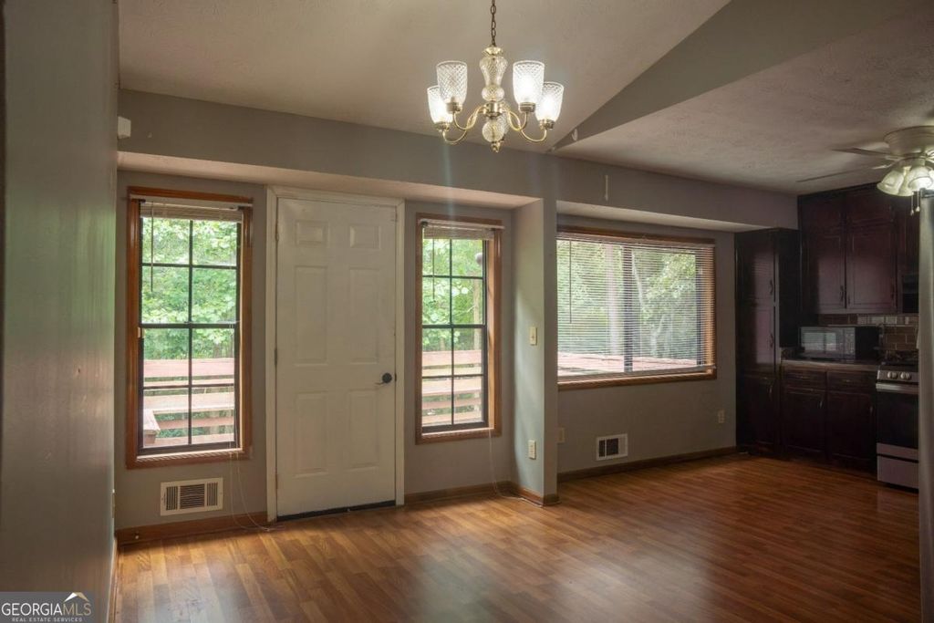 Photo of 381 Windsor Walk SE, Conyers, GA 30094 (MLS # 10812645)