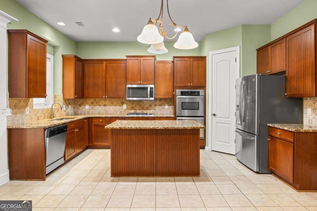 Photo of 1128 Gateview Drive, Lawrenceville, GA 30046 (MLS # 10756820)