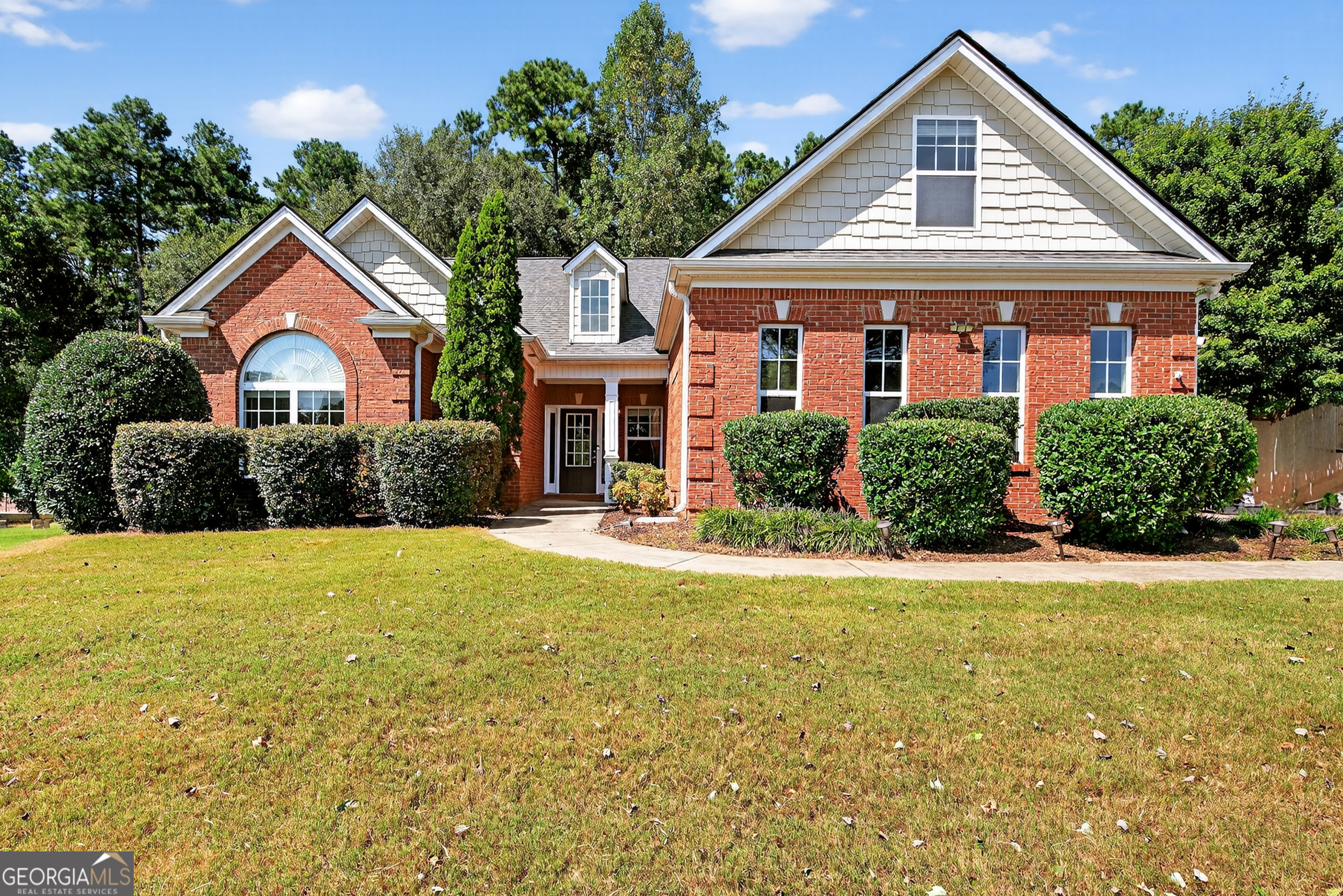 Welcome to 2658 Ivey Lace Ct, Bethlehem, GA. This brick-front, 1-story ranch offers 4 bedrooms and 3 full baths, plus a versatile bonus room that could easily function as a 5th bedroom, office, or flex space. Inside, you'll find an open floor plan with a bright and inviting living area, a kitchen with granite countertops and ample cabinetry, and a large master suite with tray ceilings and abundant natural light, creating a comfortable retreat. The exterior is equally impressive with a large fenced backyard, complete with a gazebo, deck, and patio-perfect for outdoor living and entertaining. While the home could use a little TLC, the updates needed are not major, offering excellent potential for investors, first-time buyers, or those looking to downsize without sacrificing space. Conveniently located in Gwinnett County, this property provides the charm of Bethlehem living with convenient access to shopping, dining, and major roadways.