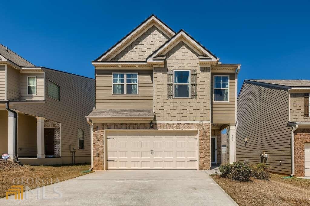 Welcome home to the LIKE NEW 4 bedroom 2.5 bathroom by DR Horton with tons of UPGRADES! This property sits on a wonderful manicured lot, 2 car garage, extended walkway entry leading from front to your private fenced back yard complete with a gazebo for entertaining. Features an open concept with extended granite countertops in the kitchen overlooking the family room, stainless steel appliances, 5 burner stove, and hardwood floors on the main, with gas fireplace. This property also offers a half bath on the main with 2 full baths on the upper level. Upstairs you have 4 bedrooms, an oversized master with his and hers walk-in closets. Not to mention a fully tiled & glassed shower, double vanity. Minutes away from Camp Creek Marketplace and Hartfield Airport.