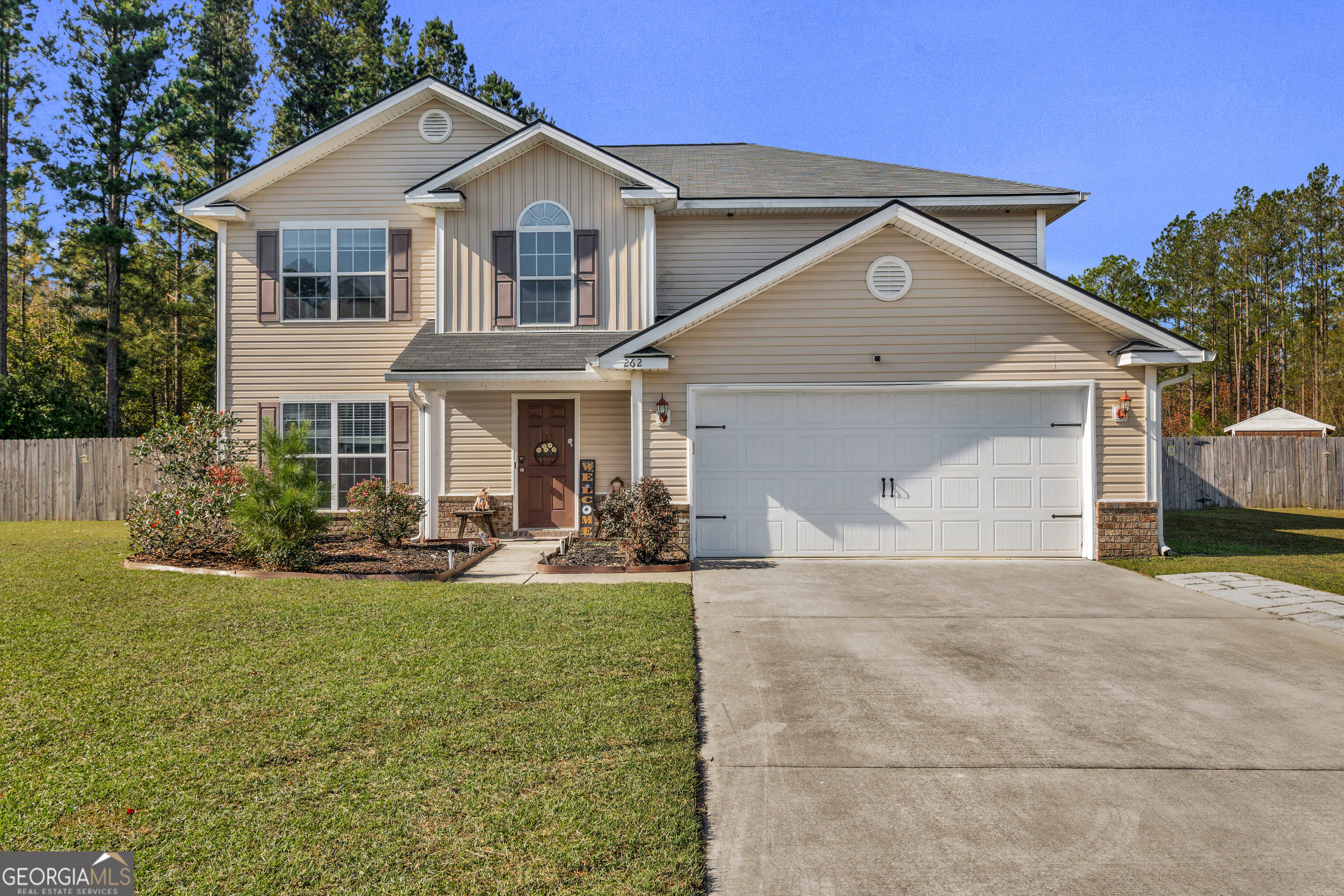This home features a beautiful layout that has been well maintained, including a flex or activity room with a nice-sized kitchen and family room. The upstairs features a large owner's suite and three other bedrooms including the laundry room. Plenty of room on this one-acre lot located on a cul-de-sac. COMES WITH TWO STORAGE BUILDINGS! No HOA fees!
