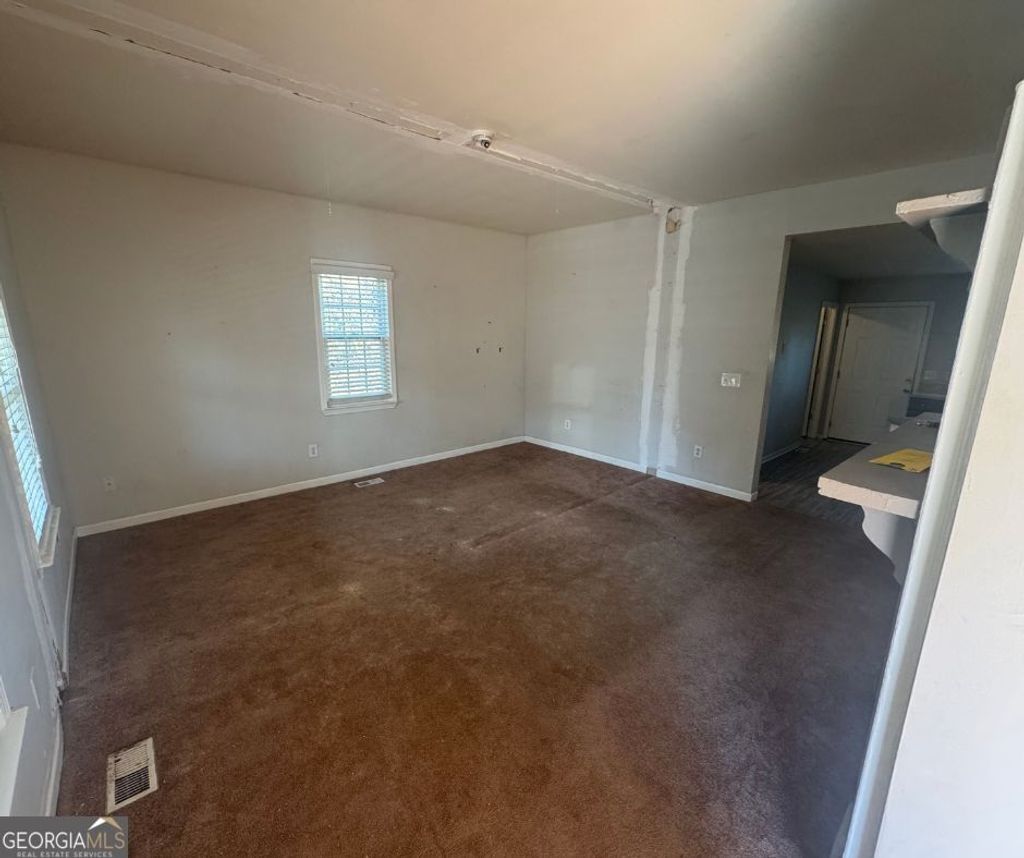 Photo of 5608 Pine Street, Flowery Branch, GA 30542 (MLS # 10683893)