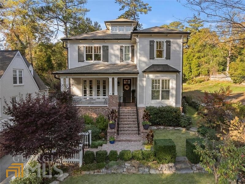 Stunning newer construction home in coveted Garden Hills! This 6 bed 5.5 bath home with a 2 car garage was built in 2014 and has been impeccably maintained with hardwood floors throughout, and beautiful natural light! This home is truly an entertainers dream with an open concept layout, seamless indoor/outdoor living, and gorgeous kitchen! The main level features a separate dining room with doors that open to the inviting front porch, bedroom with full bath, and a spacious yet cozy fireside living room with wood beams that opens to the kitchen. The kitchen features a breakfast area, large center island, Thermador SS appliances, beautiful marble countertops, and plenty of cabinets for storage space! Next to the kitchen is the Butler's Pantry with a beverage fridge, sink, and large walk-in pantry! French doors from the kitchen opens to the covered back porch with fireplace and deck overlooking the landscaped flat backyard with custom fire pit. Upstairs features the oversized primary suite, laundry room, and secondary bedrooms. The luxurious primary suite has a fireplace, morning bar, and a spa-like bathroom with soaking tub, large shower and 2 spacious walk-in closets. The secondary bedrooms are all generous in size with walk-in closets, and perfectly updated bathrooms. The lower level features a bonus/flex room that is perfect for a home gym or office! This home is truly move-in ready with ample storage space throughout. Just a short distance to the Garden Hills Pool & Duck Pond, and just minutes from the best shopping and restaurants Buckhead has to offer! You do not want to miss this one!