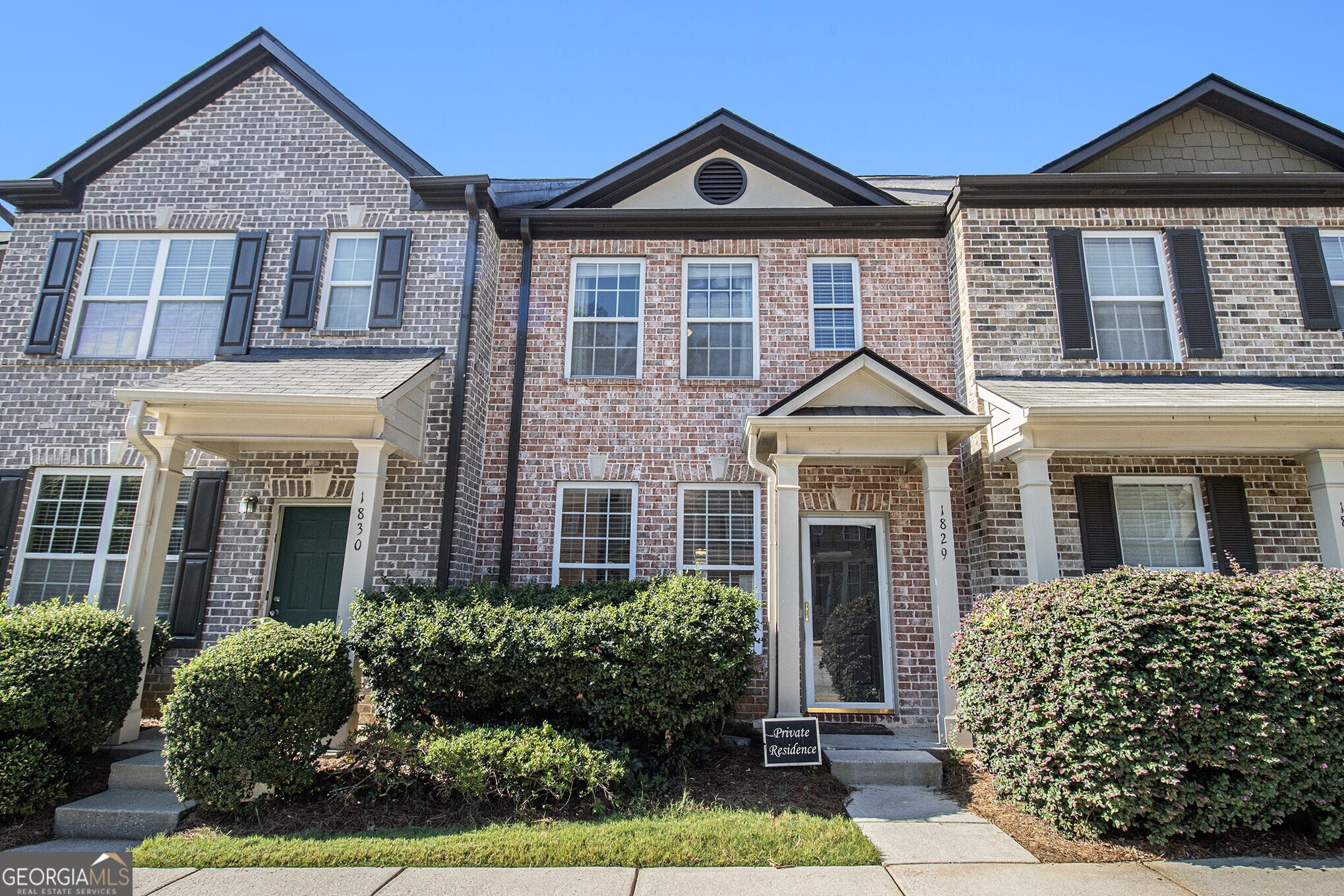Charming Townhome in the Villages of East Point with Excellent Amenities and Location! Welcome to this stylish Ready Townhome nestled in the friendly and well-maintained Villages of East Point offering Low HOA Fees and a prime location just minutes from Downtown Atlanta, the Westside BeltLine, and Hartsfield-Jackson International Airport. With quick access to I-75/85, I-20, and MARTA, commuting is effortless. Inside, the Main Level offers a thoughtful layout featuring a separate Dining Room, a central Kitchen with Stainless Steel Appliances, Tile Backsplash, and generous Cabinet and Counter Space, plus a Fireside Family Room that opens to a Private Patio perfect for outdoor relaxation. A convenient Half Bathroom rounds out the main floor. Upstairs, the Primary Bedroom boasts a Walk-In Closet and a Private Ensuite Bathroom with a spacious Tiled Shower. Two additional Bedrooms share a well-appointed Hall Bathroom with a tiled tub/shower combo, providing space and comfort for guests or family. Enjoy the added peace of mind with recent updates including a New Roof, Water Heater, Washer/Dryer, and Dishwasher all installed in 2023. As a resident, you'll have access to fantastic Community Amenities including a Pool, Playground, Clubhouse, and Picnic Area. Enjoy easy living with modern comforts, community perks, and unbeatable access to everything Atlanta has to offer.