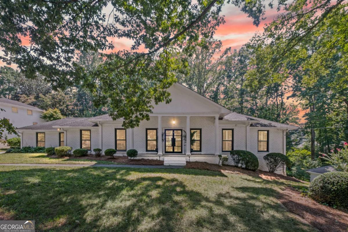 Just Listed in River Shore Estates - Fully Renovated Ranch with Walkout Basement & 4-Car Garage! ? Welcome to this stunningly renovated ranch in popular River Shore Estates on the Atlanta/Sandy Springs border! Featuring 5 bedrooms, 5 full baths, two chef's kitchens, two laundry rooms (one with a dog wash!), and a finished walkout basement - this home truly has it all. The main level offers an open floor plan with a brand-new chef's kitchen, 3 spacious bedrooms, and 2 full baths, including a luxurious owner's suite. Enjoy the sunroom with French doors, elegant moldings, and gorgeous hardwood floors throughout. The terrace level features a perfect in-law suite with 2 large bedrooms, 3 full baths, an office, and living room with fireplace, and a second kitchen. Rarely found, this property also offers 4 covered parking spaces - an attached 2-car garage plus a detached 2-car garage! ?? Prime Location - Minutes from top-rated schools, shopping, dining, and major highway The appraisal report, completed by DS Murphy on August 15, 2025, is available upon request.
