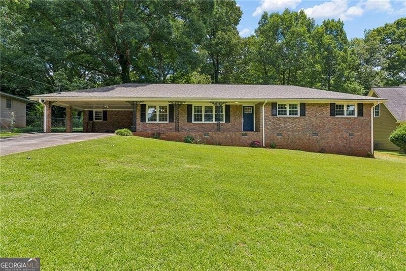 Photo of 536 Rimrock Trail, Stone Mountain, GA 30083 (MLS # 10796247)