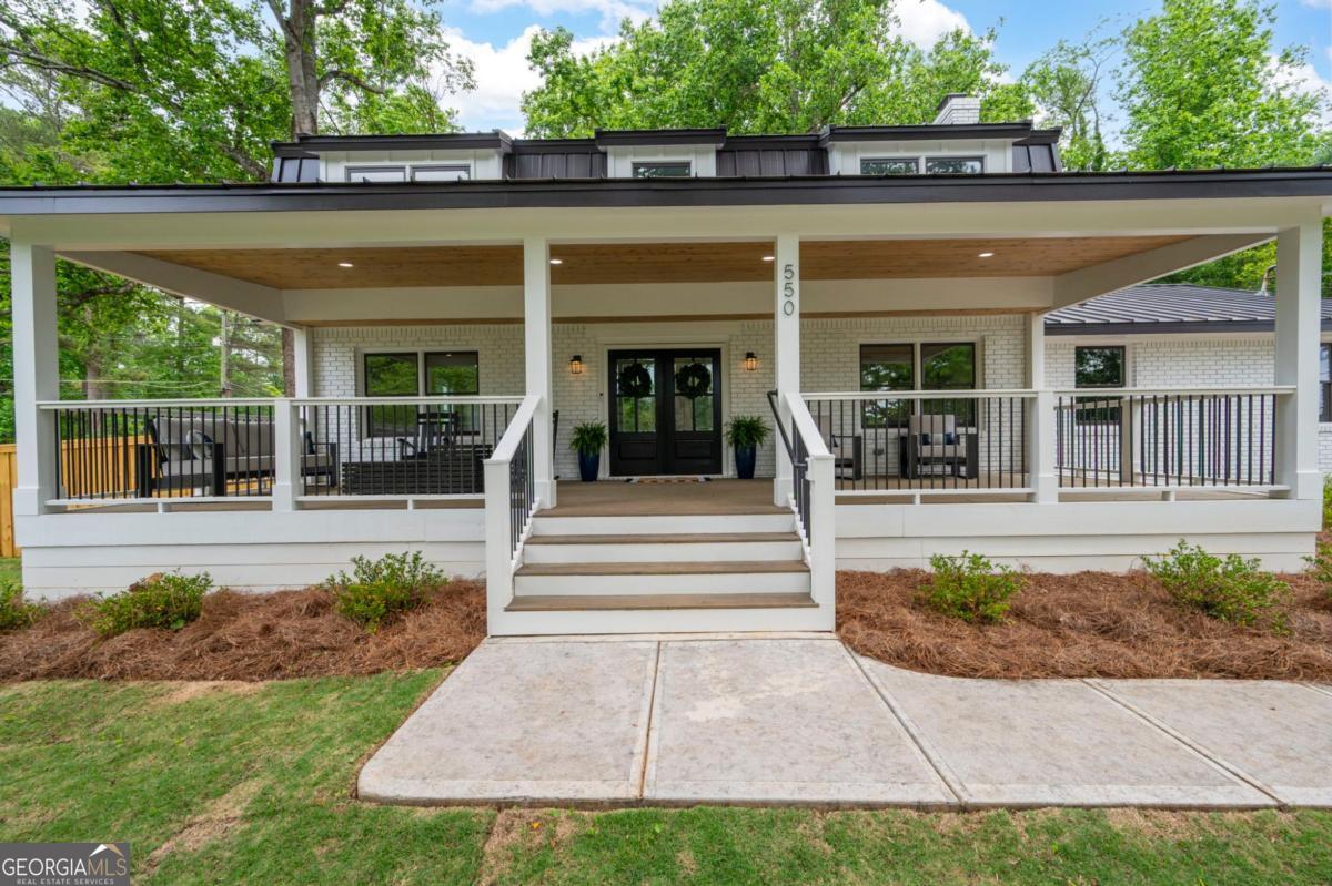 Completely renovated Beautiful Modern Farmhouse in Historic Marietta, just minutes from the Marietta Square. This home has been transformed into a Dream Home, with well over $250K in renovations & upgrades, showcasing an updated floor plan & updated style to make it the perfect living space. Large Premium Corner lot with beautiful hardwood trees. Relax & enjoy the viewpoint from the perfect elevation while sitting comfortably on the spacious covered front porch. Southern Charm at its finest! This Marietta Beauty offers hardwood flooring throughout. The main floor consist of - Family Room w/gas log fireplace & view to Kitchen, Formal Living Room, Dining Room, Large Gourmet Kitchen w Stainless Steel, Quartz, Island w pop-up outlet, soft close cabinet drawers & doors, backsplash, two pantries, Laundry Room, a half bath & lots of storage. Upstairs you'll find Two Primary Bedroom Suites, a Secondary Bedroom, & an Office (there are 3 gorgeous full baths upstairs). Home features new 40 year warranty metal roofing system, two new Lennox HVAC systems & new ductwork, new hot water heater, new doors & windows, new lighting, custom closets, insulated attic and encapsulated crawl space, and so much more. This is not a typical flip. Sellers intended for it to be their home, they lovingly and thoughtfully renovated the home inside and out. Fenced backyard is huge & perfect for entertaining, it features a deluxe privacy fence, patio, & outdoor storage building for tools. New Driveway & new walkways. Perfectly located in a Prime location near Kennesaw Mountain trails, Marietta Square, shopping, restaurants and everything you need for living a vibrant Marietta lifestyle.