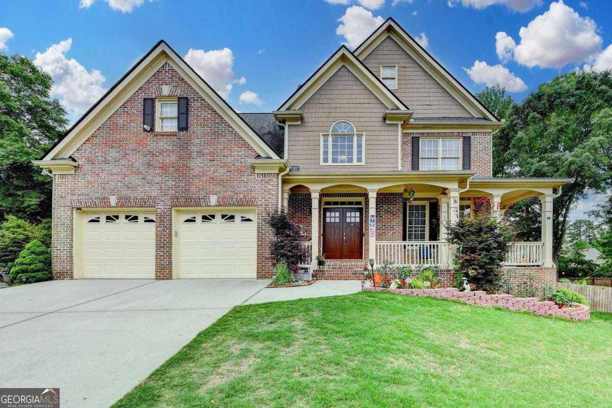 Spacious 6BR/2.5BA Home on Basement. Beautiful two-story home on a quiet cul-de-sac in the sought-after Wheatfields community, located in one of the best school districts in Gwinnett County (Grayson schools). Features include custom built-ins, formal living & dining rooms, a large kitchen with Corian counters, tile backsplash, and a spacious fireside family room. Upstairs offers 6 bedrooms, including a generous owner's suite with a jacuzzi tub and walk-in closet. The partially finished basement with 2 bedrooms and stubbed for a full bath-perfect for future expansion. Enjoy outdoor living on the covered deck overlooking a newly fenced backyard, ideal for entertaining or relaxing. Recent updates: 4-year-old architectural roof, New water heater (2017), Replaced garage door openers, and new fenced. Double front doors (2020) Top-tier community amenities: 2 pools, 2 tennis complexes, 2 clubhouses, playgrounds, sand volleyball, and a soccer field.