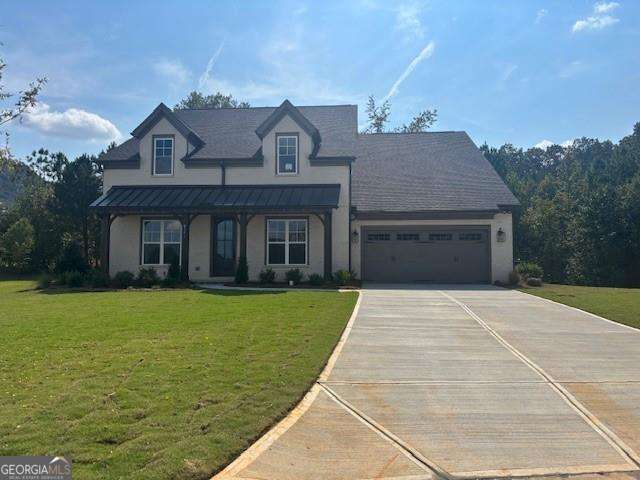 Welcome to Heirloom, where legacy is built into every detail and The Ashland plan offers more than just a home-it offers a life well lived. Available for 30-day move-in, this lovingly crafted residence is sited on a premium cul-de-sac homesite, surrounded by the serenity of Forsyth County and the distinct charm of this thoughtfully planned community. With sweeping open-concept spaces, the Ashland maximizes the joy of gathering-featuring a chef-inspired kitchen with oversized island, a family room and dining areas that flow seamlessly to covered outdoor living. Retreat to the main-level owner's suite, complete with spa-inspired touches and a generous walk-in closet. Flex study, mudroom, secondary bedrooms on the main, plus an upstairs bonus room option provide versatility for work, guests, or growing families. Heirloom isn't just where you live-it's how you live. Tranquil walking trails, resort-style amenities including pool, clubhouse and pickleball court, and expansive green spaces make it a place for connection, rest, and recreation. All this just minutes from Cumming's best schools, shopping, and dining. Don't miss this rare opportunity to move into a home that blends timeless design with modern comforts in a neighborhood built to endure. Contact us today-make The Ashland at Heirloom your forever home.