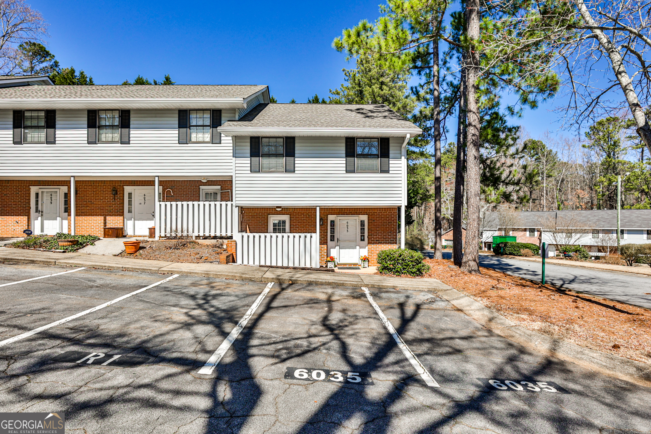 End Unit Condo town home, perfectly situated in a serene, well kept neighborhood. enjoy the best of both world-peaceful surrounding with convenient access to everything the area has to offer. Inside you are greeted by a bright,freshly painted interior and an open concept floor plan that enhances the natural flow of the living space. Luxury vinyl tile flooring on the main level. Spacious kitchen with stainless steel appliance and generous counter space,Wonderful outside space with enclosed porch offering a flexible space. Upstairs you will find a roomy primary suite, along with two additional bedrooms and a full bath. Located directly across from the community pool and dog park, home combines comfort, style and convenience.Property is located in a census tract that allows for a variety of down payment assistance programs. In addition, Gwinnett County is offering a down payment assistance program. Ask agent for more details. ***Rental cap has been met.***