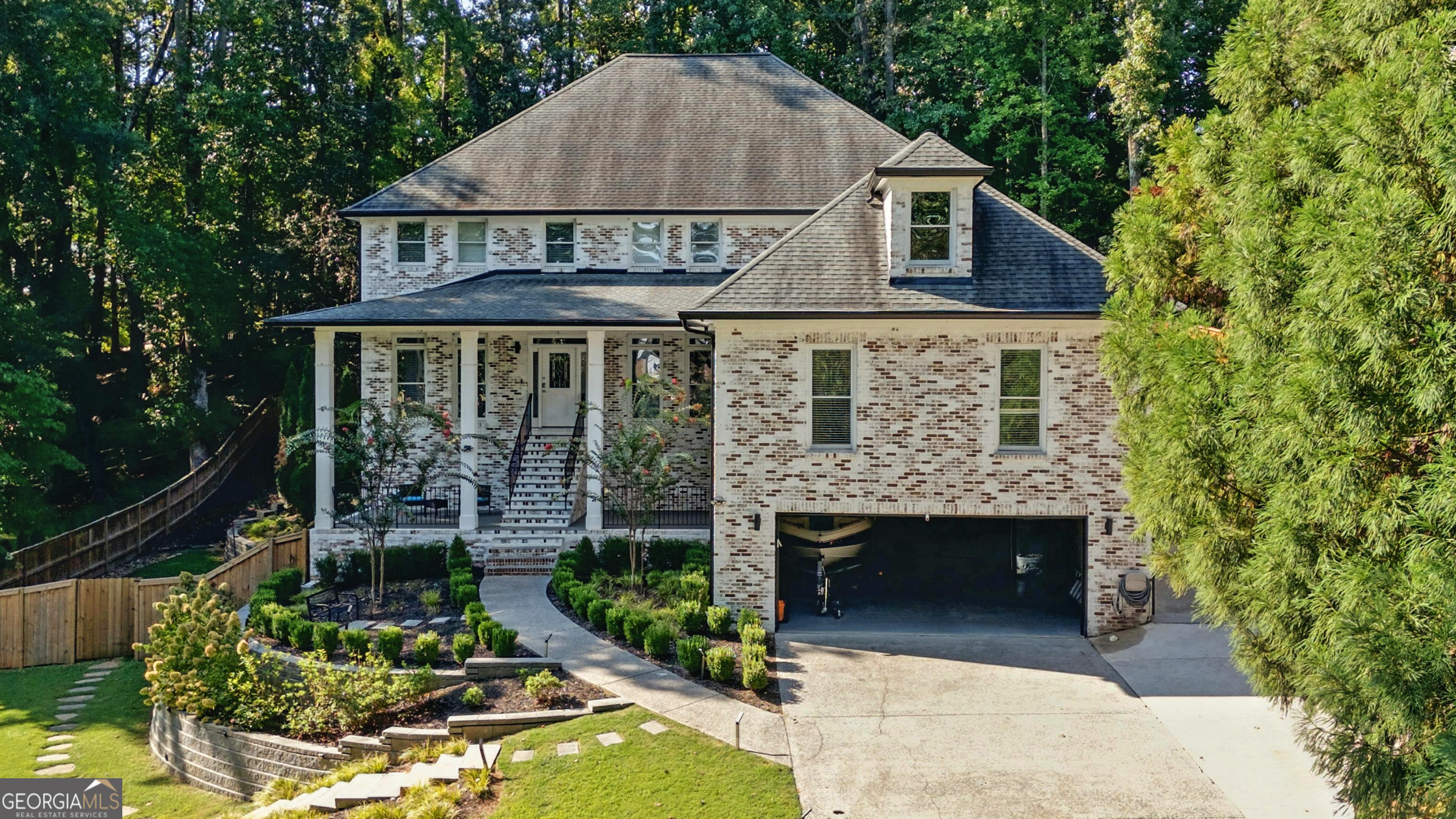 OWNER FINANCING AVAILABLE WITH A 30% DOWN PAYMENT: This stunning 7-bedroom, 6-bathroom custom-built home has been meticulously upgraded with luxury renovations, offering an exceptional blend of elegance, functionality, and modern convenience. Nestled on 0.47 private acres in a sought-after swim community, this home is just minutes from Historic Marietta Square, Kennesaw Mountain National Battlefield Park, major roads, and top-tier shopping. Step inside to discover a thoughtfully designed layout featuring two kitchensCoone on the main level and another in the basementCoboth adorned with premium granite countertops. The main level offers an open-concept eat-in kitchen, a formal dining room that accommodates up to 12 guests, a spacious family room with a cozy fireplace, and one versatile bonus roomCoperfect for offices, playrooms, or additional guest space. The two-story living room adds to the home's grandeur, while plenty of closets throughout provide ample storage. The top floor boasts three spacious bedrooms, including a luxurious primary suite with dual walk-in closets, a soaking tub, and a beautifully remodeled spa-like bathroom. The additional upstairs bedrooms each have their own private en suite baths, ensuring ultimate privacy and convenience. The fully finished basement is a showstopper, featuring a separate entrance, a full commercial-grade kitchen, a private movie room with a kitchenette, a full bath, and newly installed vinyl flooring. The basement offers 2 well-distributed bedrooms, 1 additional full bathroom, and a living room with exterior private entry and additional areas to be used as storage, especially for rent and extra income. Whether used as a private guest suite or income-generating rental, this space offers incredible flexibility. Recent Upgrades & Features: Roof replaced just 3 years ago, Brand new basement water heater (1 month old) & main house water heater (2 years old), Professionally remodeled bathrooms with luxurious finishes, Fresh exterior lime-wash (6 months old) & interior paint (2 years old); New ceramic flooring installed just 1 month ago, Meticulously maintained HVAC system " last serviced 2 months ago", Extended driveway from the street to the side of the home for added convenience, Beautiful professional landscaping work, and new fence were performed just one and half year ago, perfect location in a serene stream running through the property, Located in an excellent, safe neighborhood with low or no crime, Low-cost HOA. Easy access to nature trails and a little creek crossing the lot behind the building. With soaring 14-foot ceilings, a perfect mix of hardwood, ceramic, carpet, and vinyl flooring, and abundant natural light throughout, this home offers an unparalleled blend of luxury and comfort. Don't miss out. Schedule your private showing today before it's gone! Seller's financing is available with a minimum down payment of 30%