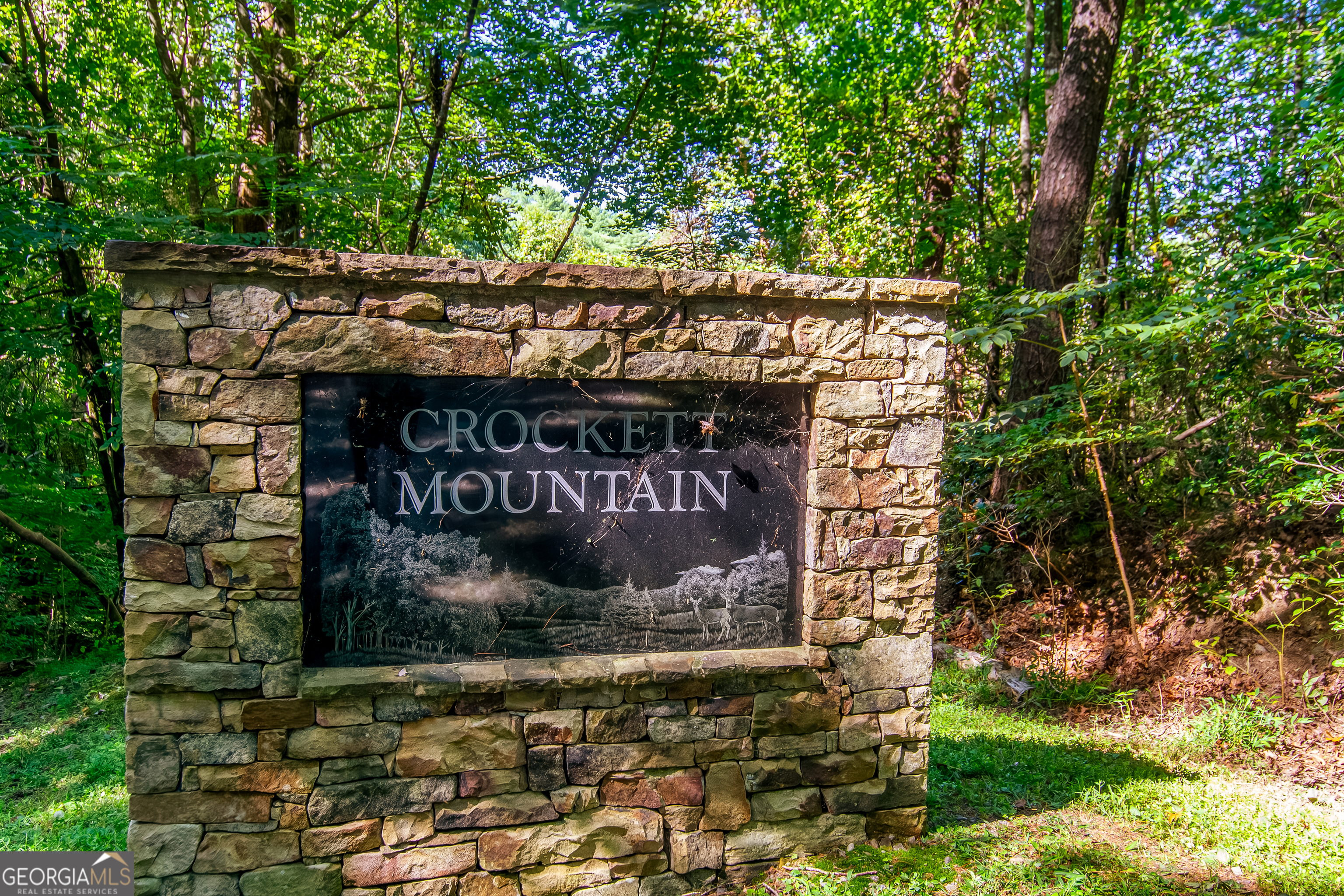Nestled in the beautiful North Georgia mountains, Lot 9 on Laurel Creek Trail offers the ideal setting for your dream cabin, vacation retreat, or permanent mountain home. This wooded parcel provides privacy, natural surroundings, and the peaceful atmosphere Ellijay is known for, while still being just minutes from downtown where you'll find charming shops, restaurants, and conveniences. With endless opportunities for outdoor recreation-hiking, fishing, tubing, and exploring the nearby apple orchards-this property combines the best of seclusion and accessibility, making it a perfect investment for those looking to enjoy mountain living at its finest.