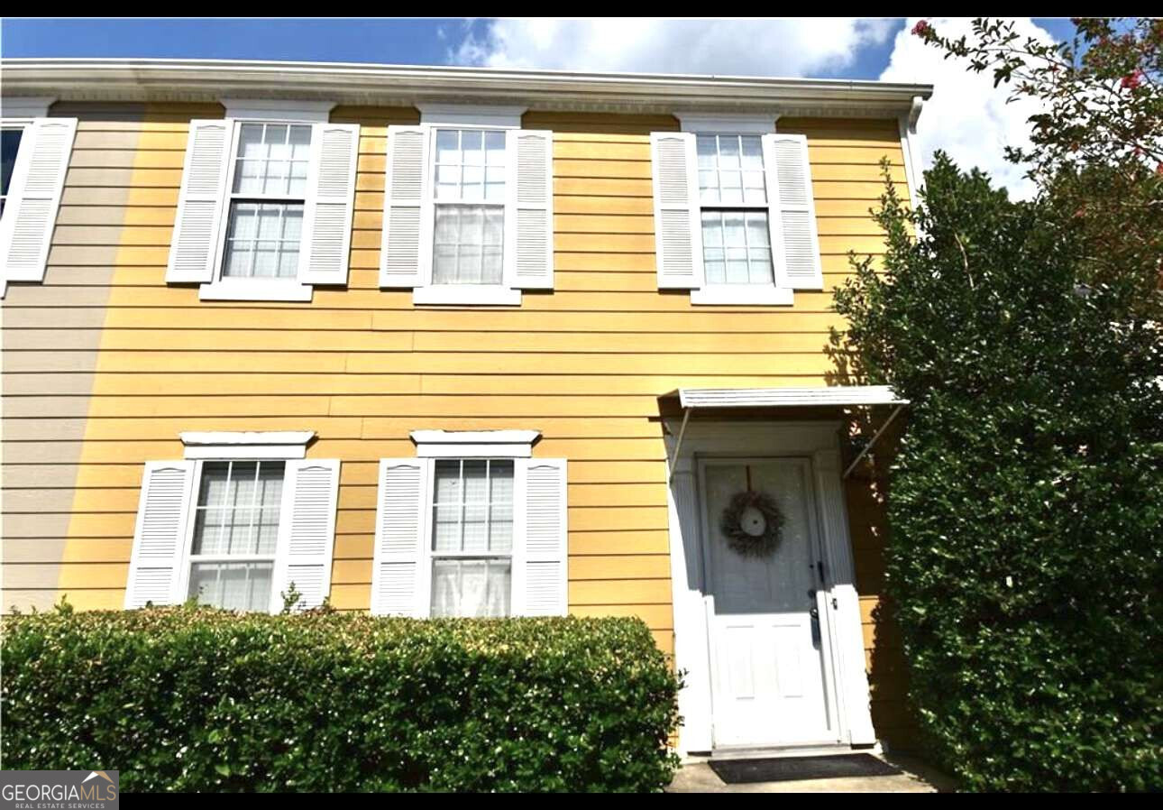 Lovely Townhouse, perfect location in Arc Way Forest Subdivision. Minutes away to I-85, Pleasant Hill and Beaver Ruin, restaurants, shopping and much more. The spacious kitchen has white cabinets, new stove and tile flooring. First level has new Luxury Vinyl Floor. The formal dining rooms connects to the spacious deck and backyard, perfect for family gatherings. The second level has 3 bedrooms, two full bathrooms. The Master bedroom is spacious and its bathroom has double vanity. No HOA. Investor owed no disclosures. Welcome home!