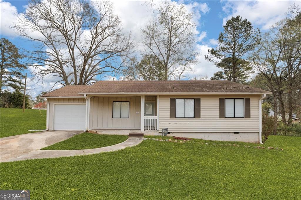 This beautifully updated stepless ranch home features: hardwood floors, vaulted ceilings, large open kitchen with solid counter tops, breakfast area, spacious bedrooms with newer carpet, renovated master bath, relatively new HVAC, separate laundry area, operational 1-car garage, storage building, situated on a large flat corner lot and ideally located near shopping/interstates. Must use Ericsson Law as Closing Attorney.