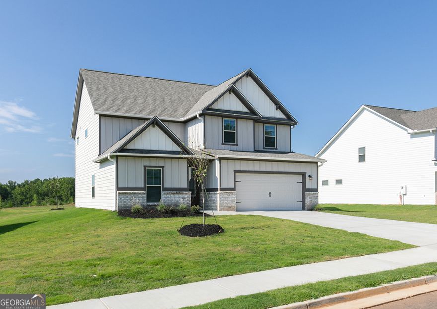 568 Cantrell Drive offers a beautifully designed home that blends style, comfort, and functionality, perfectly suited for modern living and entertaining.  The chef-inspired kitchen is a standout feature, boasting sleek quartz countertops, stainless steel appliances, and a generous walk-in pantry - a dream space for culinary enthusiasts. Just off the kitchen, the breakfast area flows seamlessly into the spacious family room, creating a warm and inviting space for gatherings. A formal dining room adds elegance for special occasions.  The main floor also includes a flexible bonus room, a stylish powder bath, and an inviting entryway that sets the tone for the home.  Situated on a higher elevation within the community, this home enjoys added privacy with serene woods beyond the sodded yard- the perfect natural retreat.  Upstairs, the luxurious primary suite offers a peaceful escape with a step-in shower, large vanity, and a spacious walk-in closet. Three additional bedrooms, a full bathroom, and a conveniently located laundry room complete the upper level, providing plenty of room for family and guests.