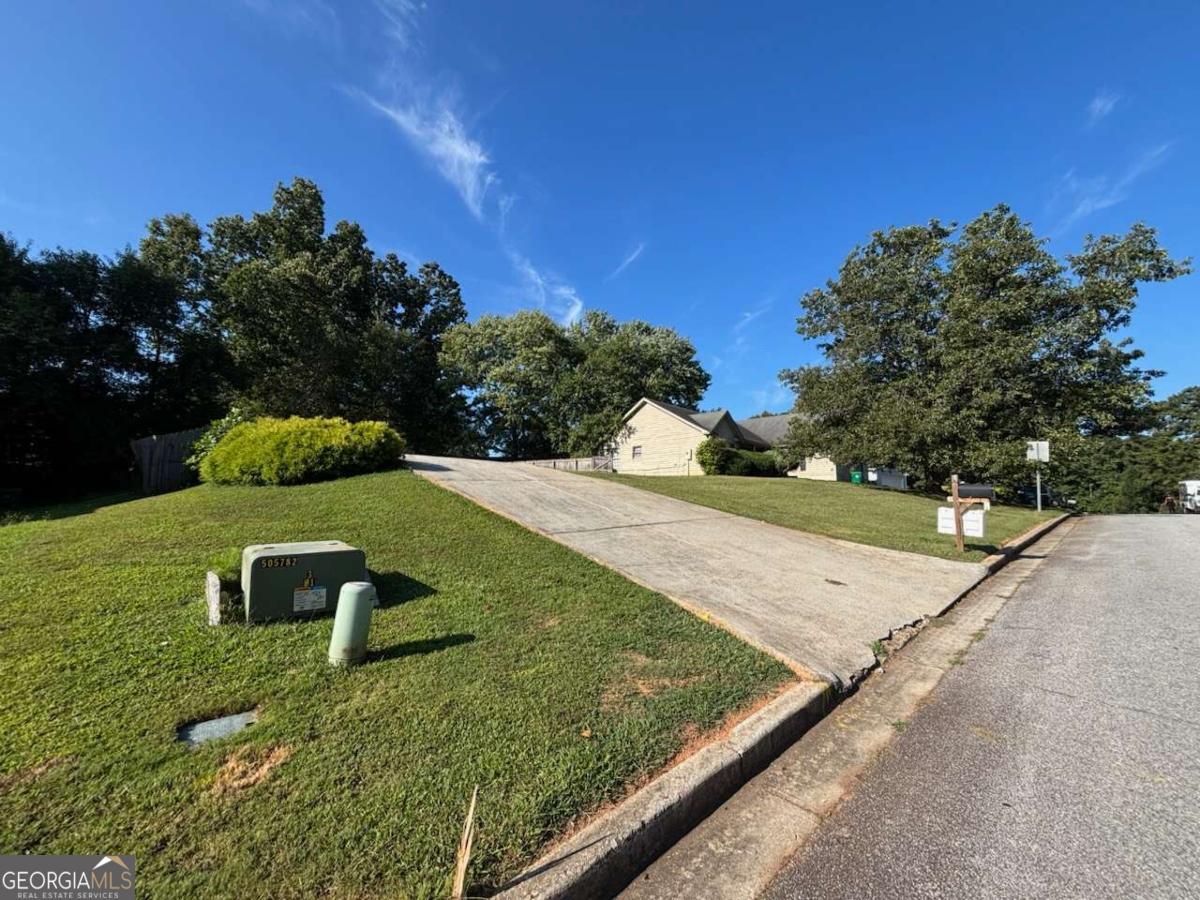 Cleared vacant lot in an established subdivision, ready for your new build! The previous home has been demolished, leaving a clean slate for your vision. A great opportunity to create the home you've been dreaming of in a neighborhood with existing infrastructure and nearby amenities. Schedule a showing today!