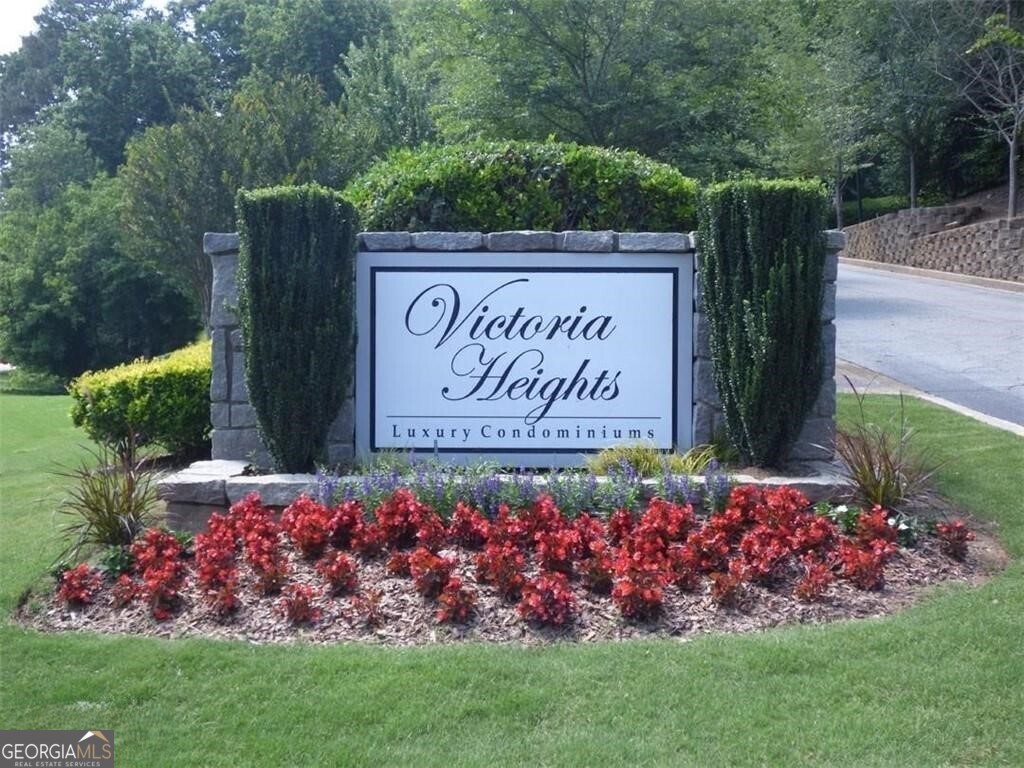 Beautiful 2 bedroom/2 bath top floor condominium in gated Victoria Heights community! Open and bright floor plan! Vaulted ceiling & hardwood floors in living room. Kitchen with granite countertops, cherry wood cabinets, breakfast bar and stainless steel appliances - all electric so no gas bill to worry about! 2 spacious bedrooms with walk-in closets each with private bath. Washer & dryer are included. Great location! Gated community with swimming pool & fitness center! Enjoy living just minutes from GA 400, I-285 shopping and restaurants!