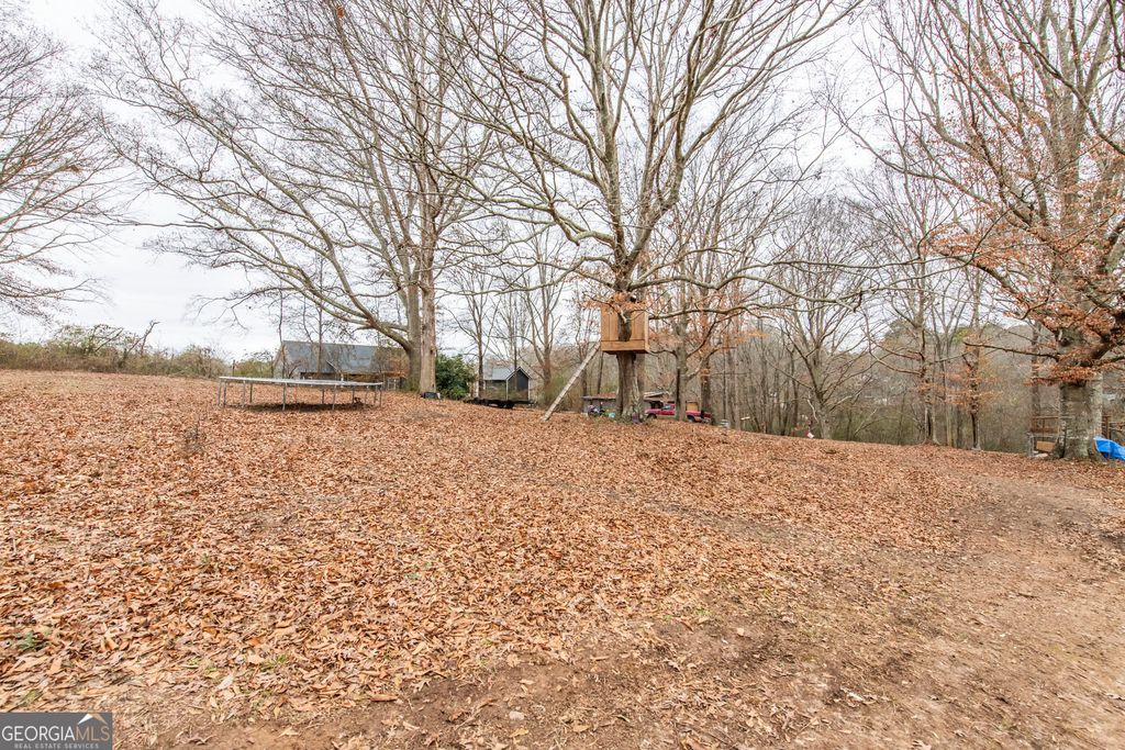 Photo of 1866 Mount Zion Road, Carrollton, GA 30117 (MLS # 10661818)