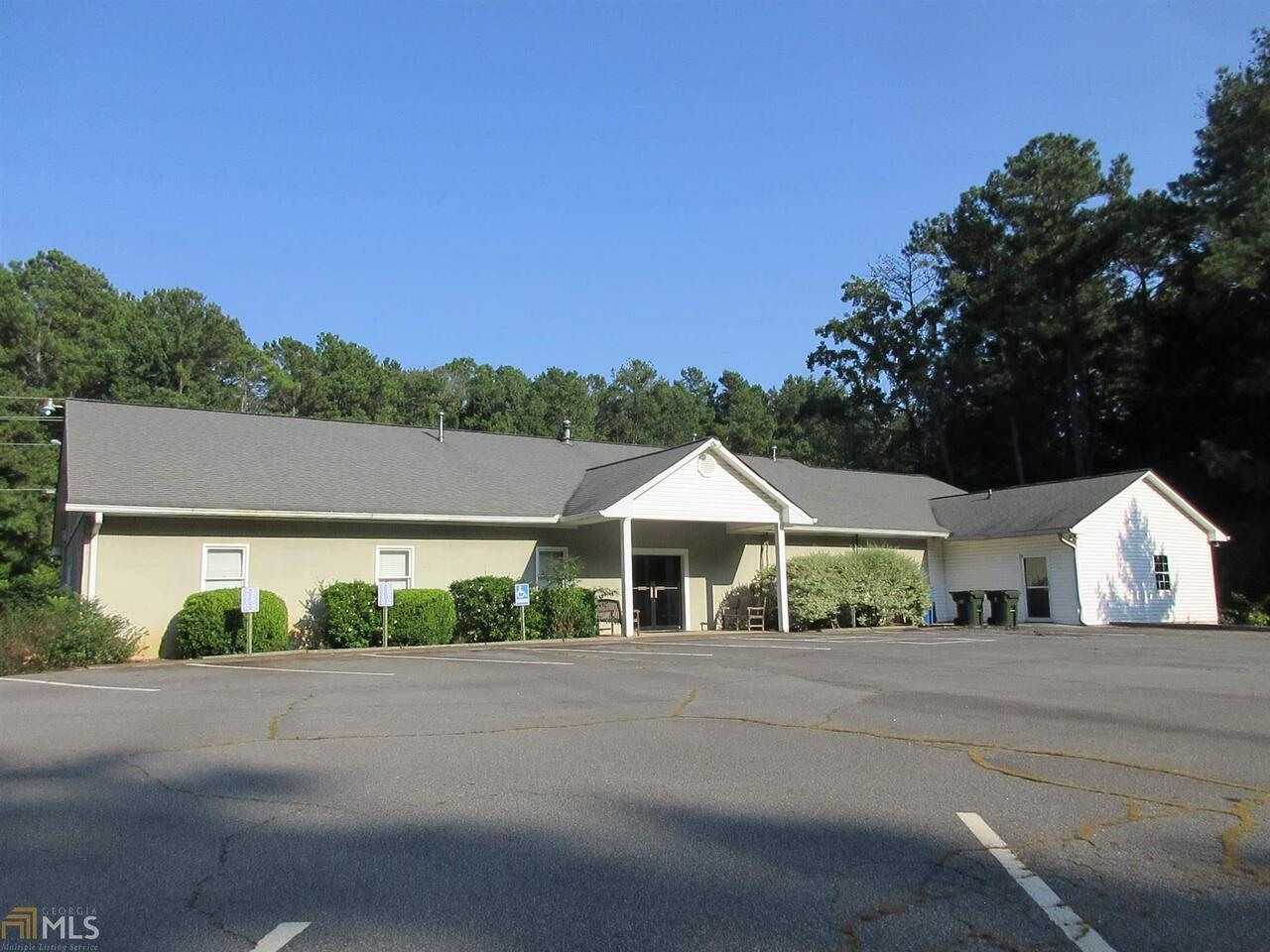 Church near downtown Kennesaw. Features 150 + seating, classroom building, Offices, Fellowship area and Kitchen, residence that can be rezoned for any light retail or office type use. Right across the road from Swift Cantrell Park. WOW! Exposure on Old 41 Hwy and Rutledge Rd. Best location in Kennesaw ALL THIS ON 9.9 acres. Good re-development parcel. Dont miss this opportunity Sale agent must be present on all showings or no co op. Showing need appointment with agent. NOTE: Sewer not right at propty. It is nearby and possibly accessed via sewage pump.