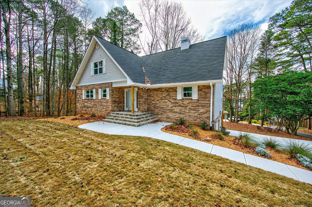 Photo of 6596 Garrett Road, Buford, GA 30518 (MLS # 10699198)
