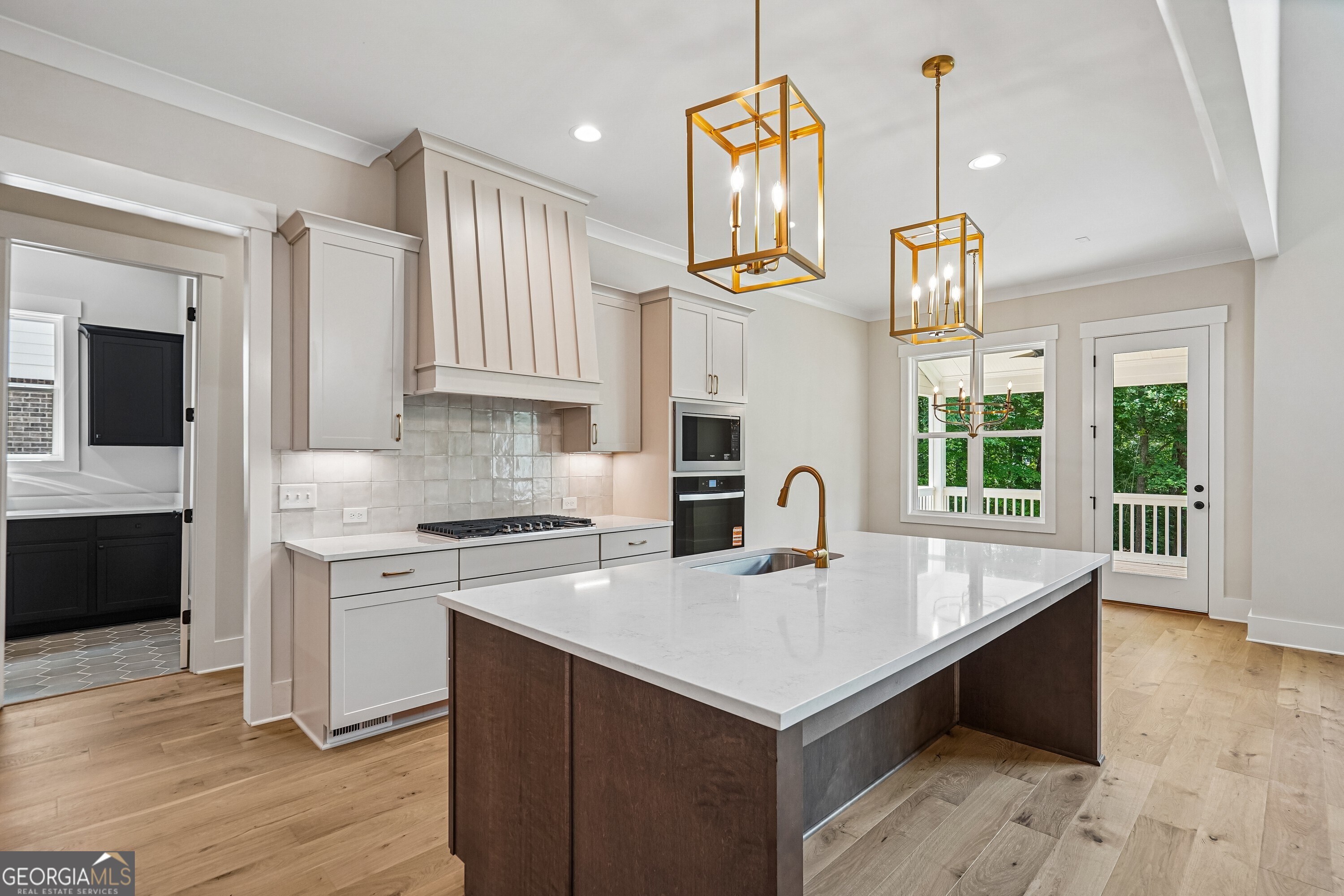 The Tamerack Plan, built by Peachtree Residential. Quick move-in! Welc – image 13