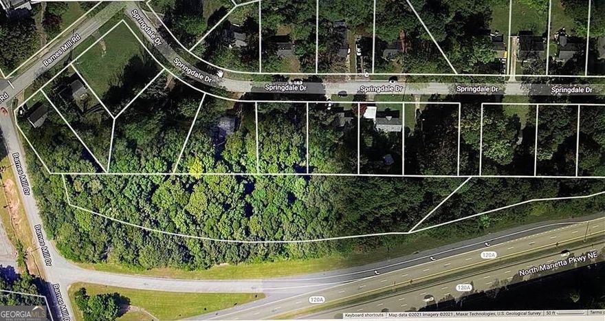 Discover an exceptional property situated within the City Limits of Marietta, commanding a prime location at the crossroads of Highway  120 and Barnes Mill Rd. Boasting a current zoning designation of CRC (Community Retail Commercial), this versatile parcel offers  boundless potential for commercial ventures. However, should residential development be preferred, the option for rezoning exists,  presenting a myriad of possibilities to suit your vision. Identified by the address 928 Springdale Drive, the propertyCOs strategic position at  the nexus of N. Marietta Pkwy and Barnes Mill Rd ensures unrivaled visibility and accessibility. Unlock the possibilities and seize this  extraordinary opportunity to shape the landscape of MariettaCOs burgeoning community.