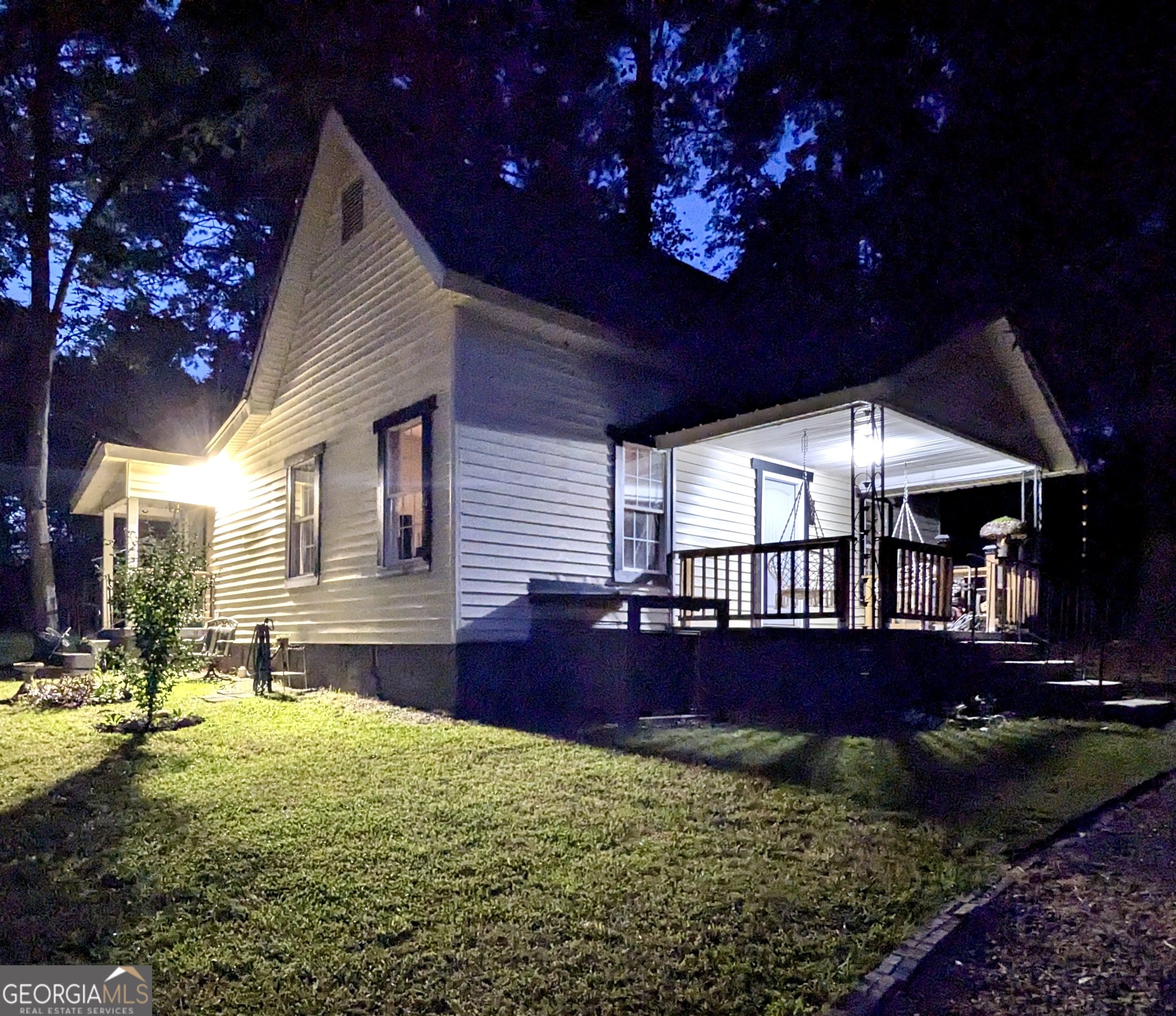 Welcome to this beautifully updated historic home in the heart of Lavonia, Georgia. The over half acre of private yard is partially fenced and sprinkled with gorgeous flower gardens and mature magnolia trees. The property also includes a storage building out back for all your tools and equipment. The front porch is so inviting and perfect for enjoying your morning coffee while sitting in one of the hanging swing chairs. Inside you'll find soaring ceilings, welcoming you into the spacious living area. There are two bedrooms and two full bathrooms, and you'll love the modern updates everywhere you look! This early 1900's bungalow went through a complete renovation less than three years ago, and it sits only two blocks from various restaurants and watering holes, including Gumlog Brewery and Circa 1918 fine dining. Shopping, city parks, and Lake Hartwell are only a short drive away, and the city of Lavonia is growing more charming every day with new businesses and weekend festivals. Don't miss out on this opportunity to live on a peaceful and large secluded lot only steps from downtown. It's too gorgeous to pass up!