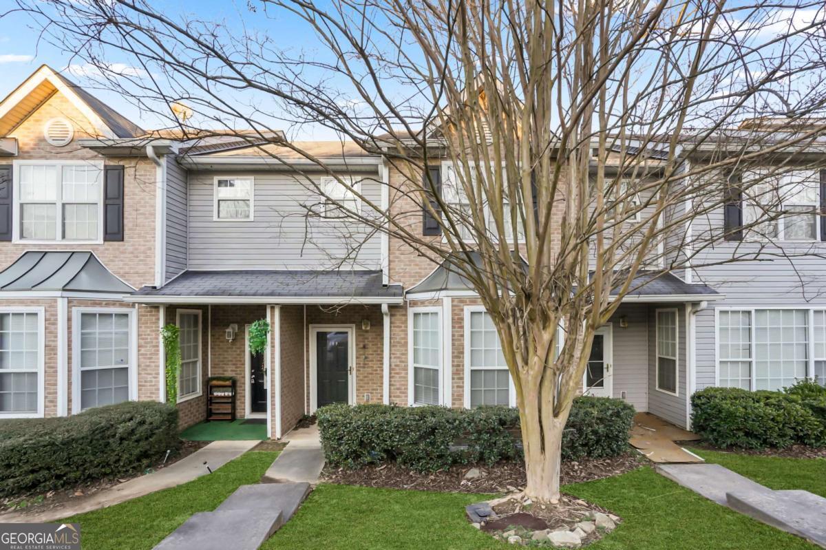 Beautiful remodeled 3-Bedroom, 2-Bath Townhome. Seller will contribute upto $5000 for buyer to utilize for interest rate buy down or towards their closing cost with acceptable offer.This home offers modern comfort and style. The main level showcases new vinyl plank flooring, while the upper level features recently installed carpeting. The entire interior has been freshly painted and enhanced with updated lighting fixtures for a bright feel. The kitchen is both functional and inviting, featuring stainless steel appliances-including a new Samsung French door refrigerator, dishwasher, and microwave. A convenient bar area comfortably seats four, perfect for casual dining or entertaining. Step outside to enjoy the back deck overlooking a two-car parking pad. Ideally located near Pine Street Elementary School and Piedmont Medical Center, this home offers both comfort and convenience. Special Financing Offer: When you finance your new home with Preferred Lender Shelly Efil of SAT Lending, you'll receive a FREE appraisal. Buyers may also qualify for 100% FHA Financing-making homeownership more accessible than ever.