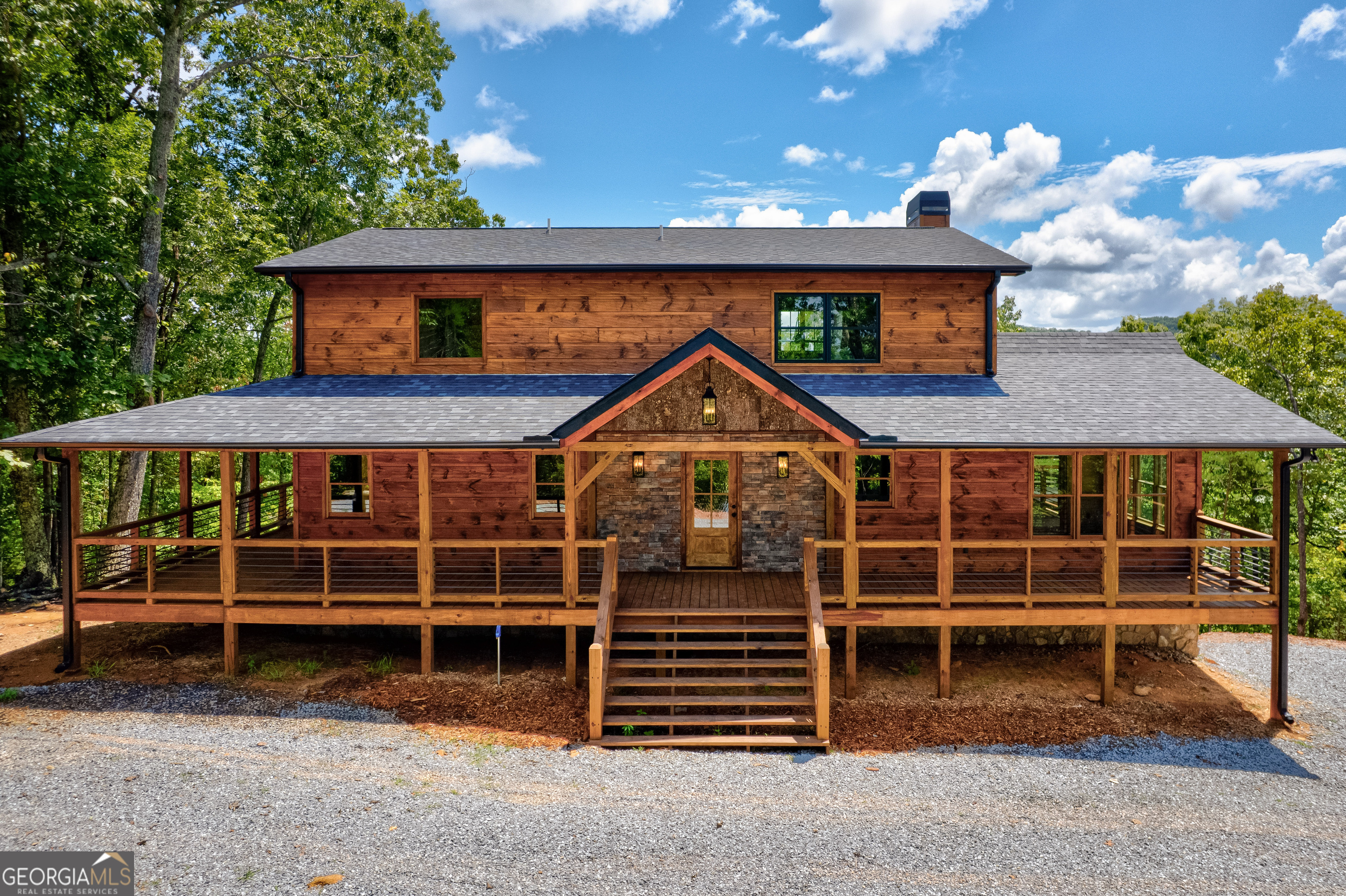 Brand New Custom Dream home with acreage for privacy and no restrictions or HOA!! Perched high on a ridge this home features stunning mountain VIEWS! This 4BR /3.5 BA home has custom tile showers, double vanities in two baths, 2 water heaters, custom kitchen cabinets with farmhouse sink and granite countertops, huge decks for outdoor entertaining and wetbar in basement. The 2.42 acre lot has room for garage or outbuilding. High Speed internet available. This one checks all the boxes!