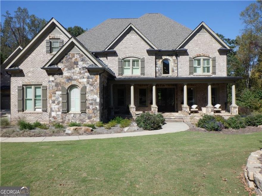 This Crown Jewell of Creekstone Estates. This home is situated on 1.2 acres, over 7,000 sqft finished, plus a carriage house with an apartment on the second level, and a FULL BA plus office/flex room on the terrace level with a "Safe Room" resort-style spa pool with slid