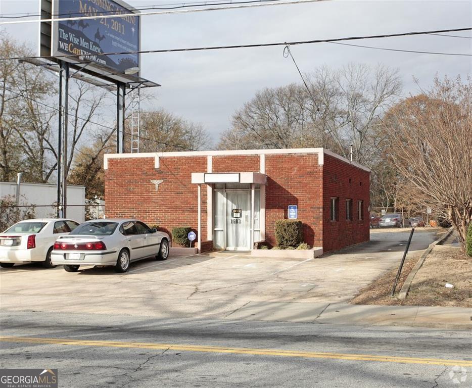 This free-standing building, previously utilized as a medical office for over twenty years, offers an exceptional opportunity for a variety of business ventures in a thriving and well-connected community. Permitted Uses: Art galleries, Banks & financial institutions, Barbershops & beauty shops, Brewpubs, Childcare Learning Center, Church, temple, or place of worship, Country Inn, Dog daycare facility, Funeral Home, Food store, Motel / hotel, Laundromat, Library, Movie Theatre, Nightclub, Office business, Office professional, Restaurants, Studio - Art, dance, photography, Retail sales , Tasting Room Reception area, exam rooms, private offices, & ample parking Excellent investment for medical professionals seeking to establish or expand their practice in a high-traffic, easily accessible location. Restaurants, retail shops, pharmacy, bank, and public transportation within walking distance Perfectly suited for medical practitioners Ideal redevelopment opportunity with multiple potential uses High traffic & direct frontage on Washington Rd
