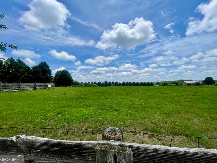 Welcome to your future homesite - a sprawling 4.53-acre lot that offers both convenience and tranquility in one enticing package. This prime piece of real estate is already cleared for construction, allowing you to begin your dream build without delay.    Perched at a higher elevation, the property promises mesmerizing views that capture the essence of both dawn and dusk. Imagine starting your mornings with breathtaking sunrises and winding down your evenings with stunning sunsets, all from the comfort and serenity of your own space.    Situated in a peaceful location, this lot provides the perfect balance of seclusion and accessibility. Despite its serene surroundings, you're only a few miles from Highway 316 and you're just a swift 15-minute drive from the bustling heart of Downtown Monroe. Here, you'll find a charming array of shops, restaurants, and community events.