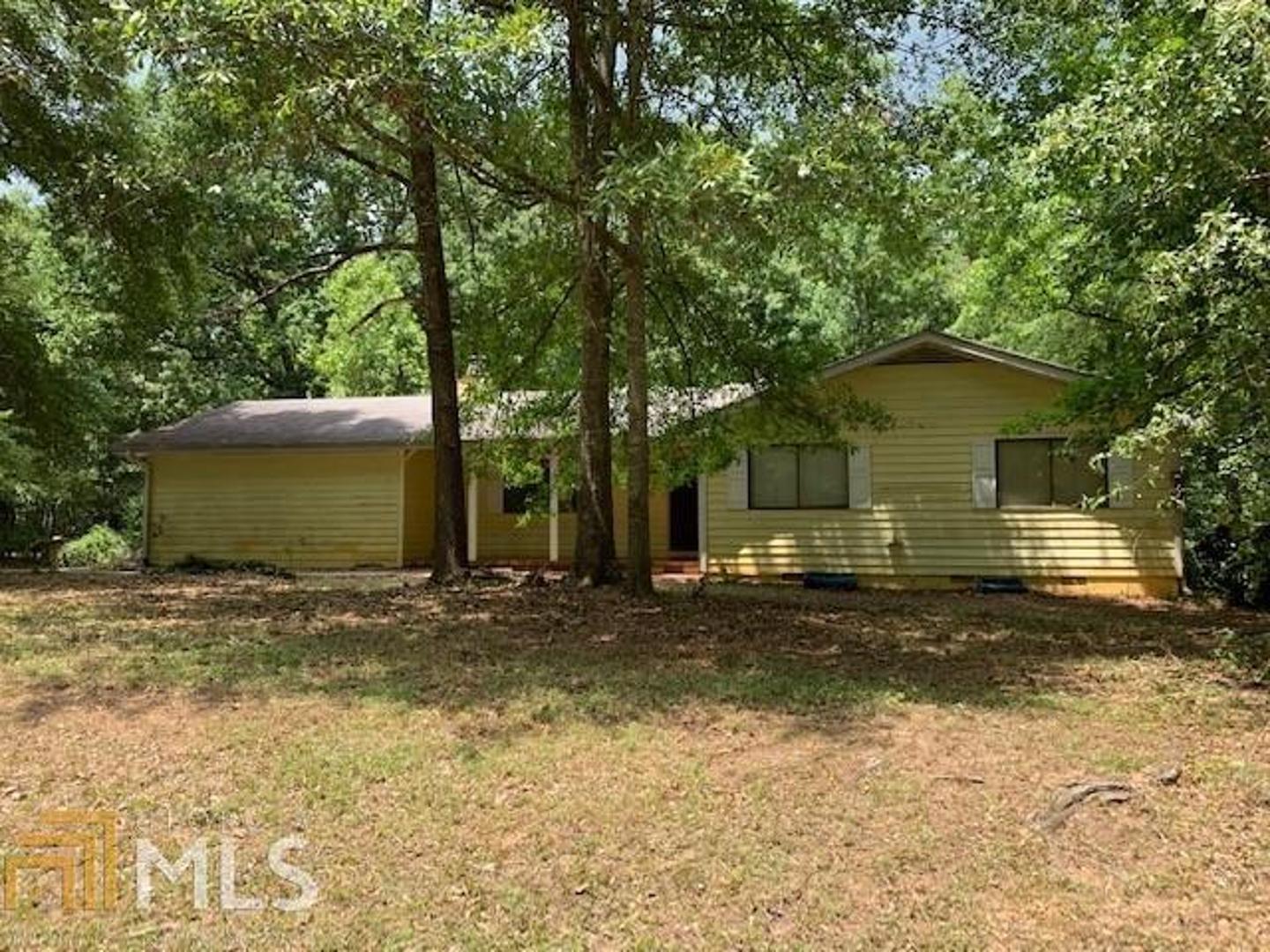 AMAZING DEAL in Conyers, Georgia! This 3bed/2bath home w/ bonus room that could be used as 4th bedroom is situated on a corner lot w/ almost one acre of land & fenced-in backyard. Ideal for first-time homeowners and/or investors looking for great rental potential. Property is conveniently located near shopping, dining, entertainment facilities, major highways and only 30 minutes from Downtown Atlanta! A Storage shed in backyard is also included in sale. Contact us today to schedule a showing!